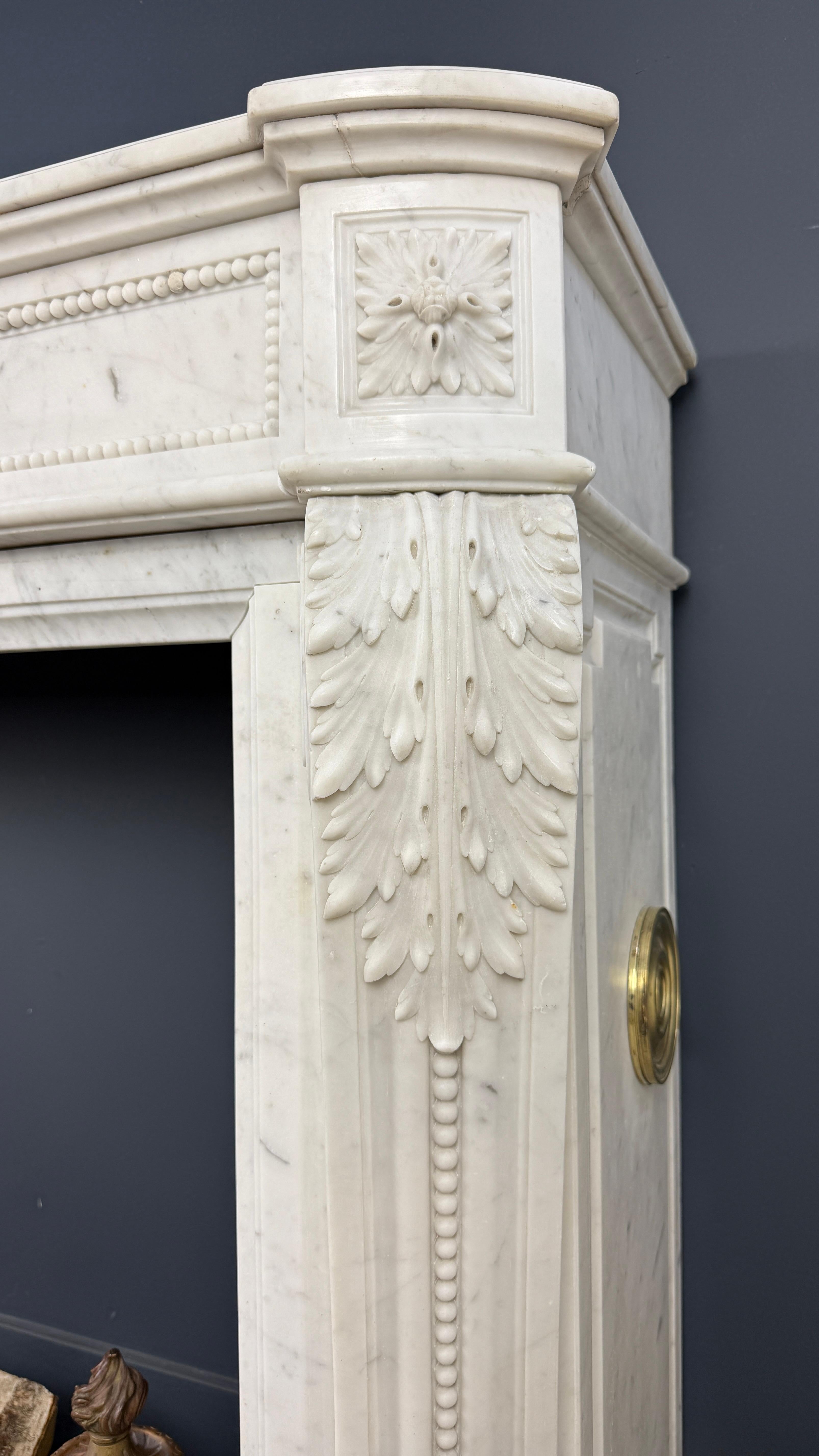 Luxurious French Louis XVI Fireplace Mantel in Carrara Marble with Rich Ornament For Sale 2