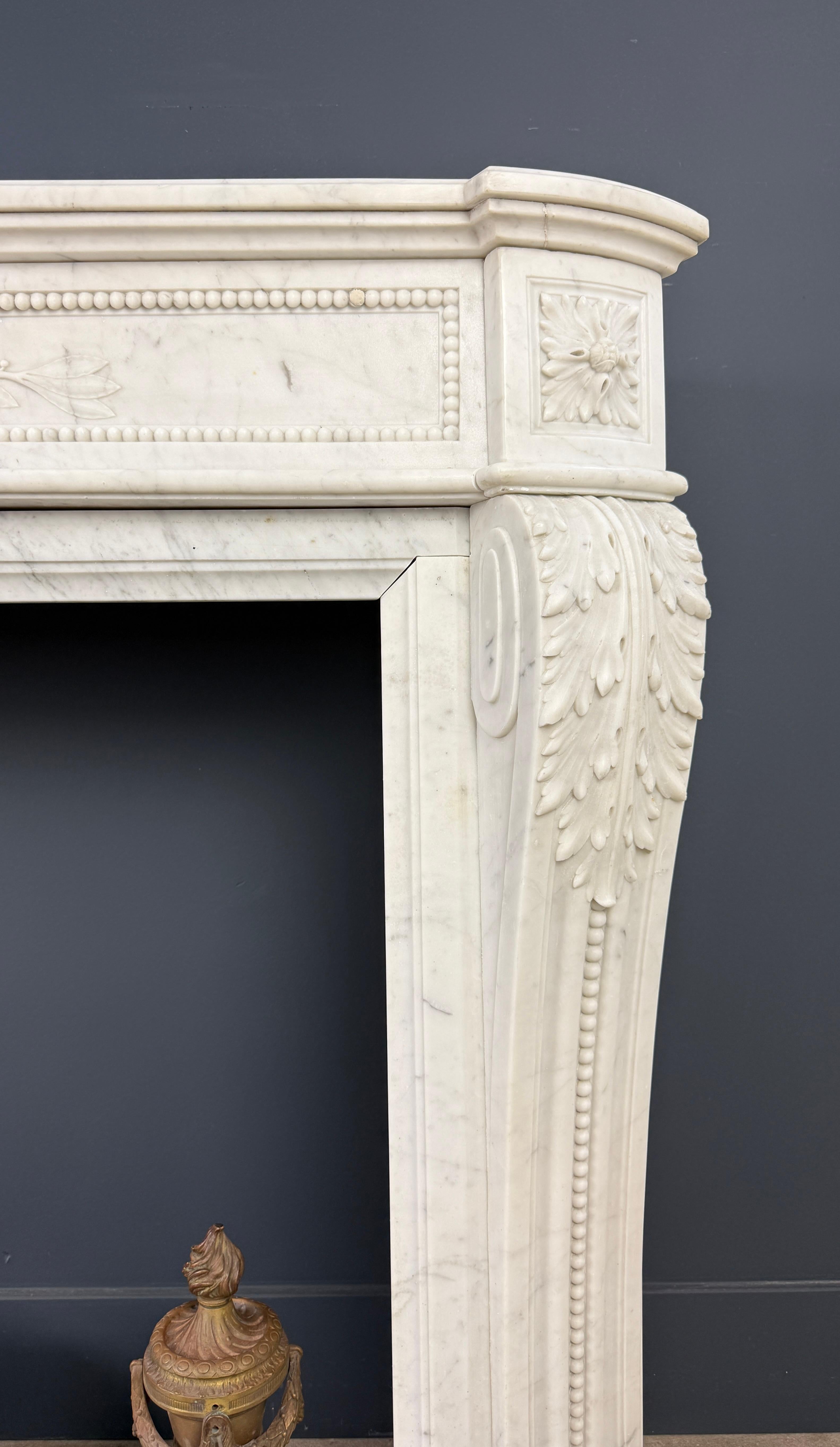 Luxurious French Louis XVI Fireplace Mantel in Carrara Marble with Rich Ornament For Sale 3