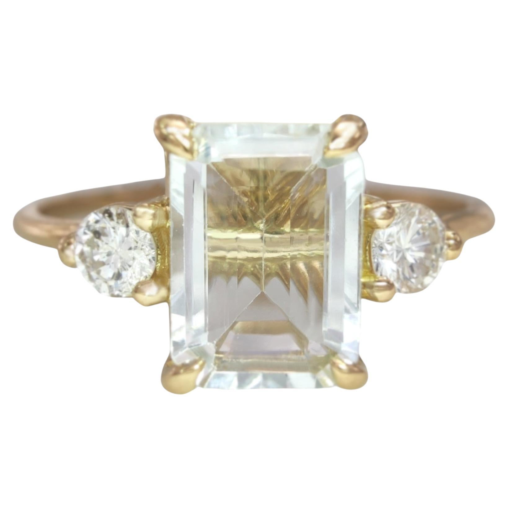 Emerald Cut Luxurious 18K yellow Gold Ring with 0.8 Carat Aquamarine and 0.13 Carat Diamonds For Sale