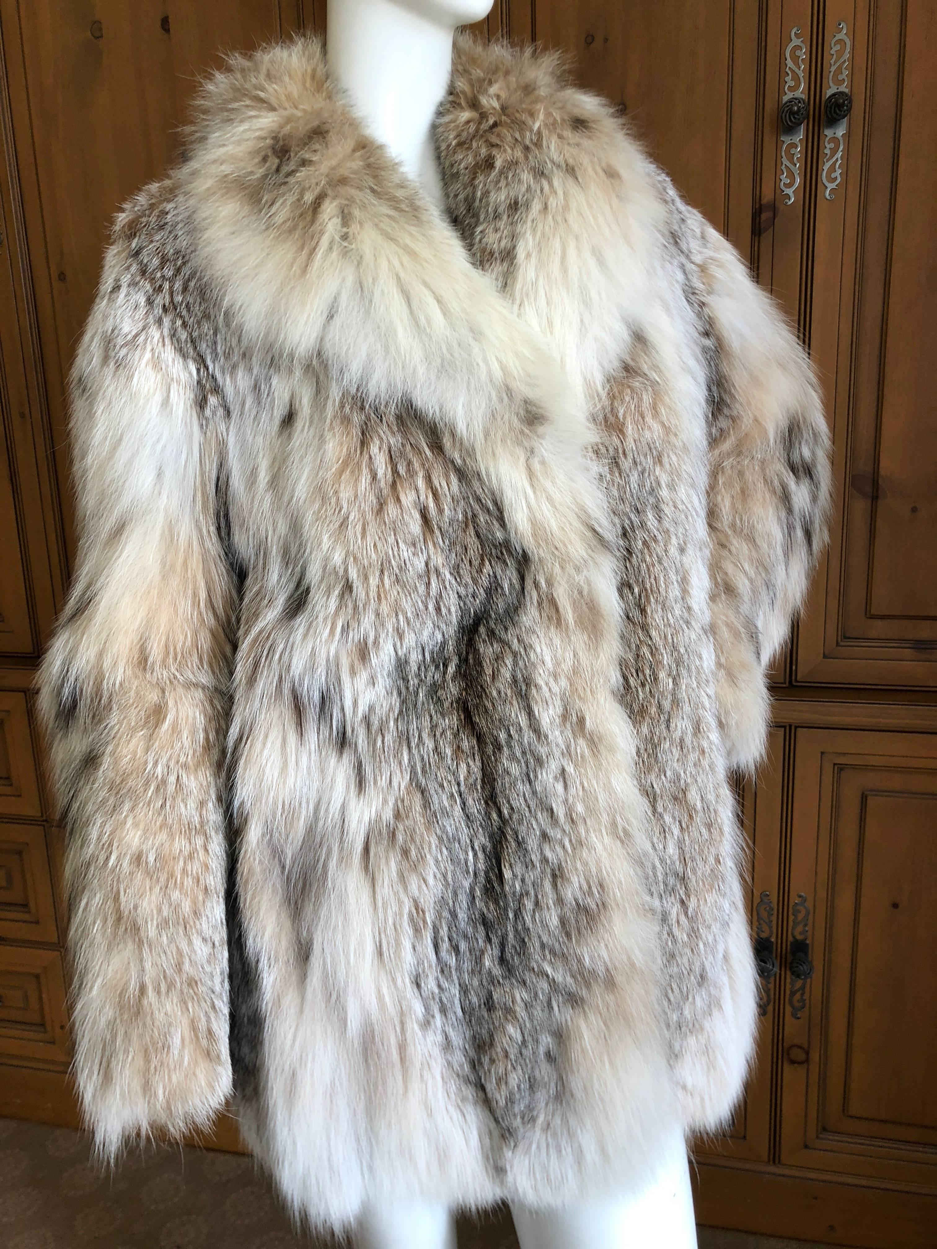  Wonderful vintage lynx fur jacket . 
Lined in silk , two side pockets, monogram in lining.
The label reads David's
 Size 40
Bust 42