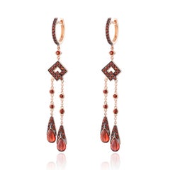 Luxuriöse geometrische Granatohrringe aus 14 Kt Roségold