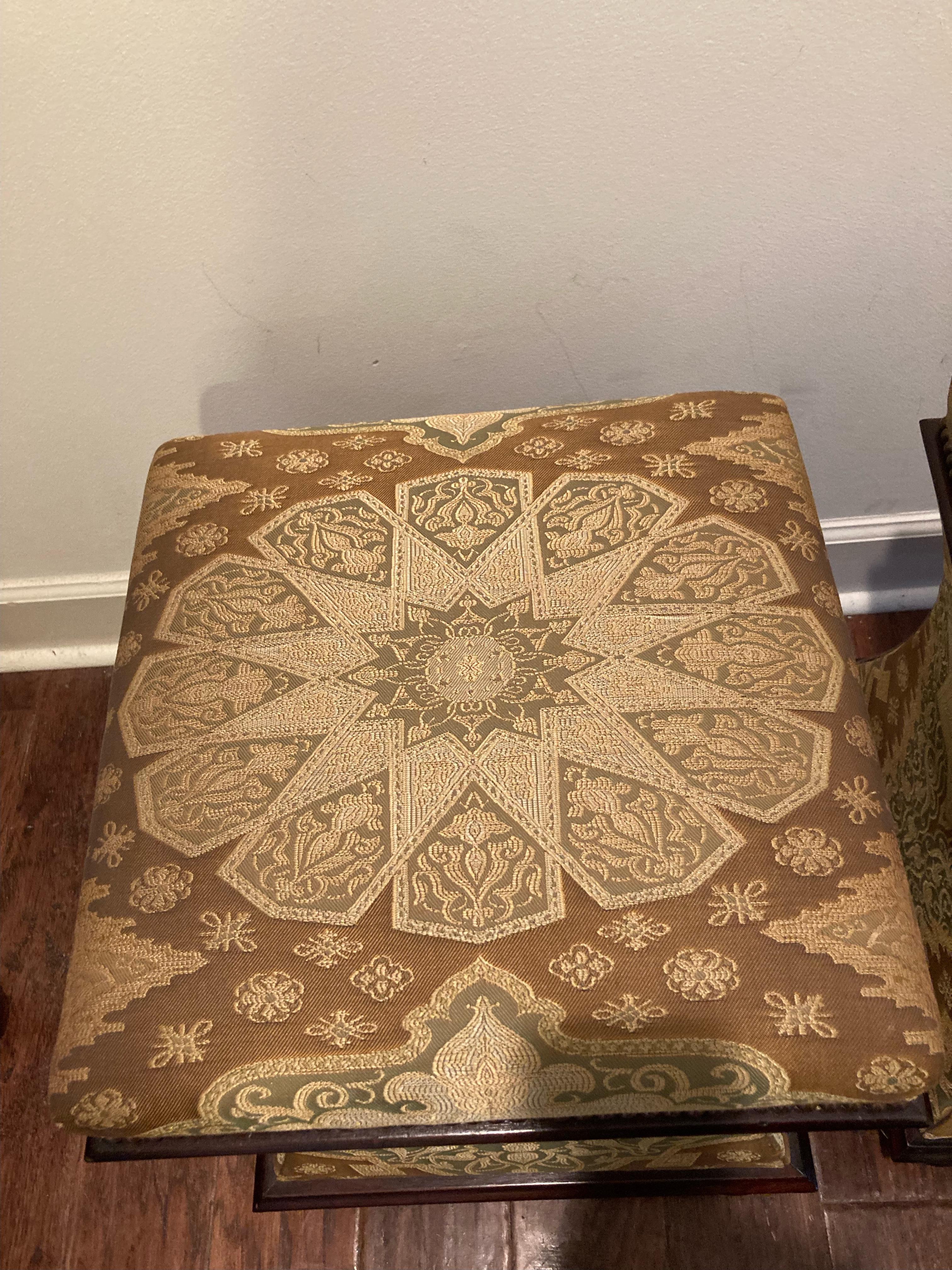 Bellville storage ottomans by George Smith upholstered in neutral tapestry fabric, finished with brass nailheads and sitting on mahogany bun feet. Tops open to reveal storage.
NOTE: Will sell individually.