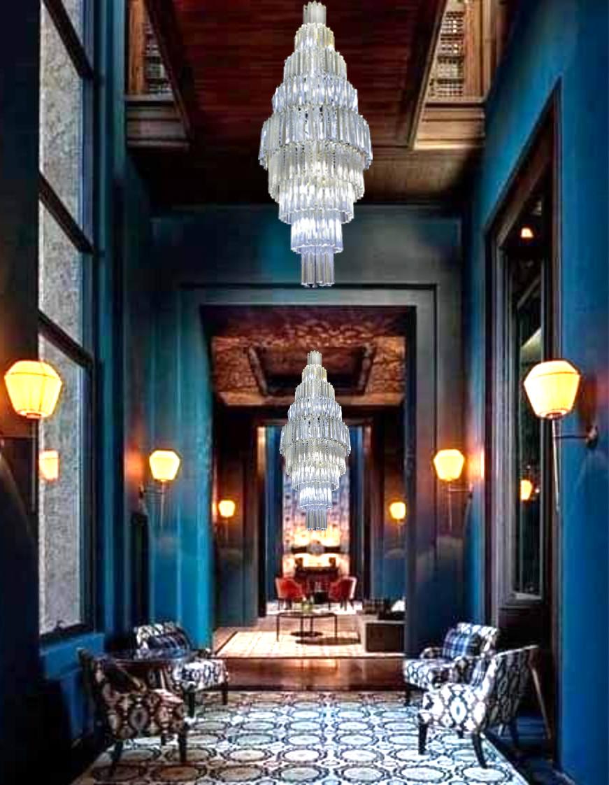 Luxurious giant Triedri chandeliers, Murano, 1980s.

Each structure consists of about 40 light points.

The height of the chandelier without chain is 190 cm, each chandelier consists of about 250 glass, the chandelier is perfect for giving unique