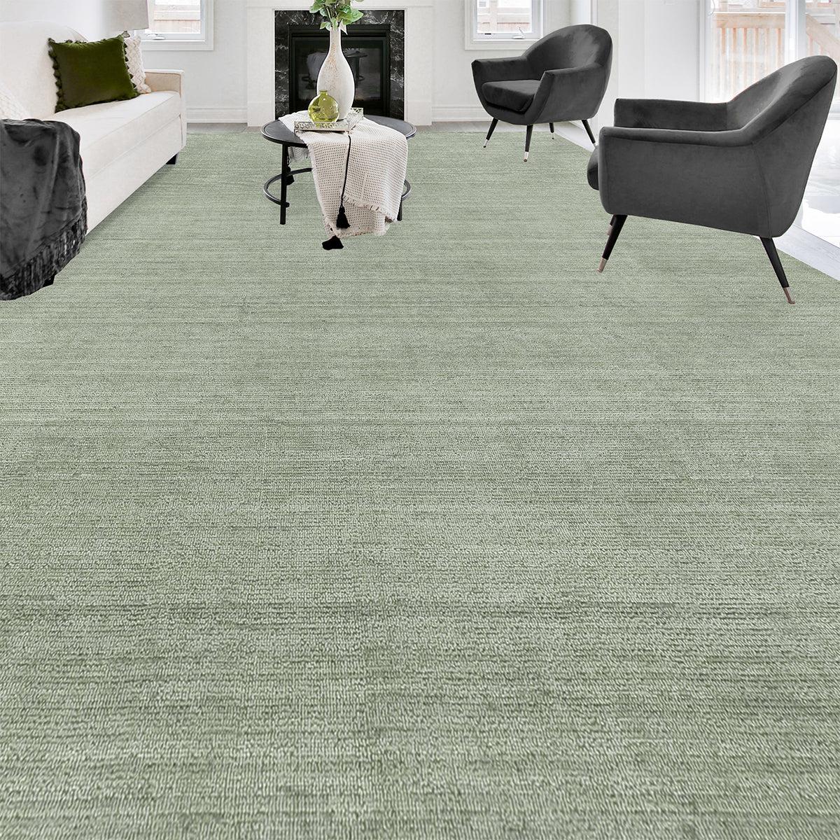 A subtle sense of texture is created by the high/low surface of this sophisticated collection of hand-loomed designs. This Luxurious Light Green rug composed of the finest viscose, has a surface that is as soft to the hand as it is rich to the
