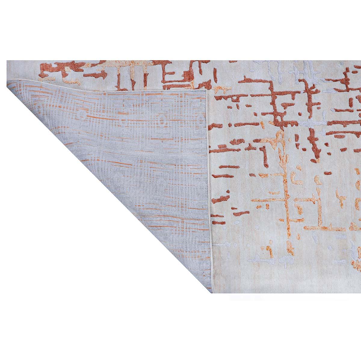 Bringen Sie mit diesem Läufer im modernen Stil einen Raum zum Sitzen. Das moderne Design in Orange und Elfenbein sowie die Verwendung von Wolle und Viskose sorgen für einen weichen und subtilen Effekt mit einem Muster, das im Licht schimmert.