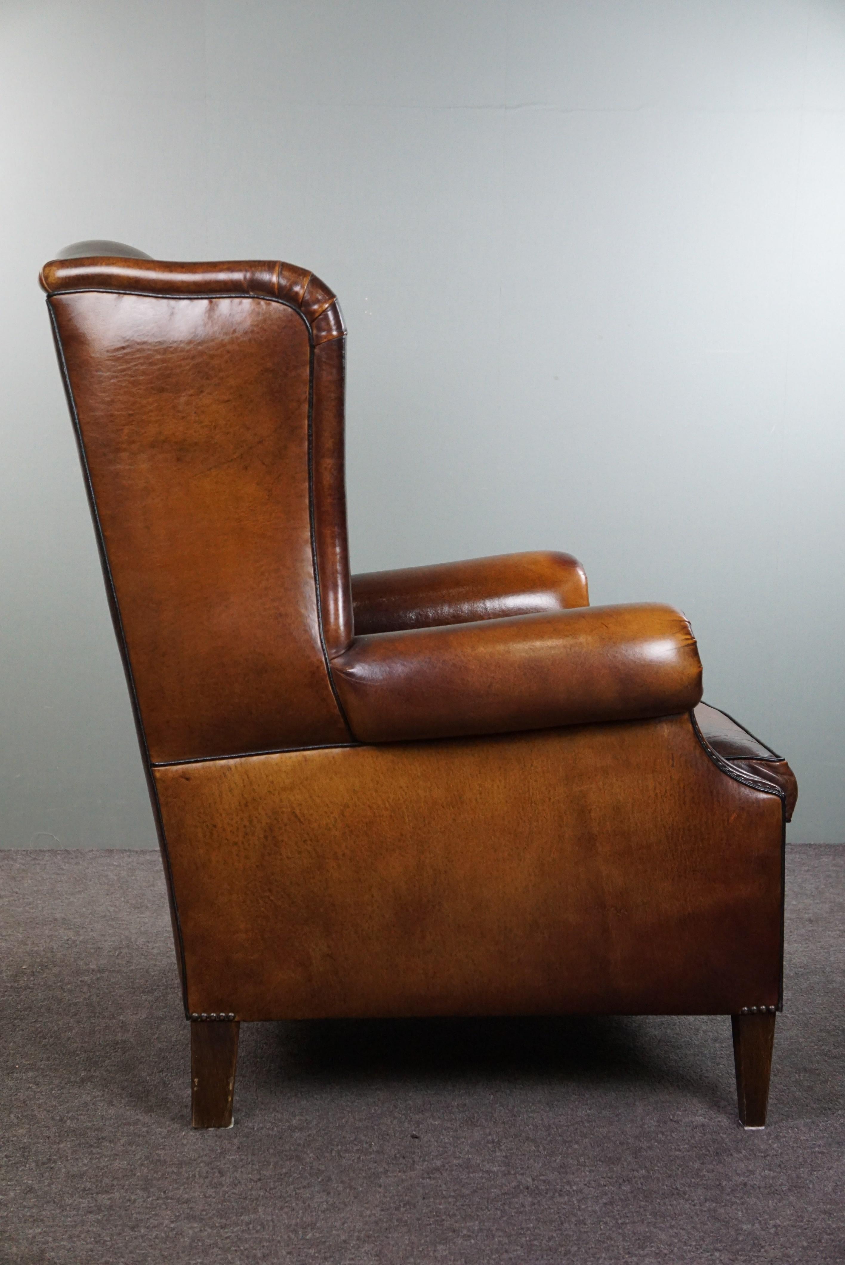 Luxurious large sheep leather wingback armchair with beautiful colors and patina In Good Condition For Sale In Harderwijk, NL
