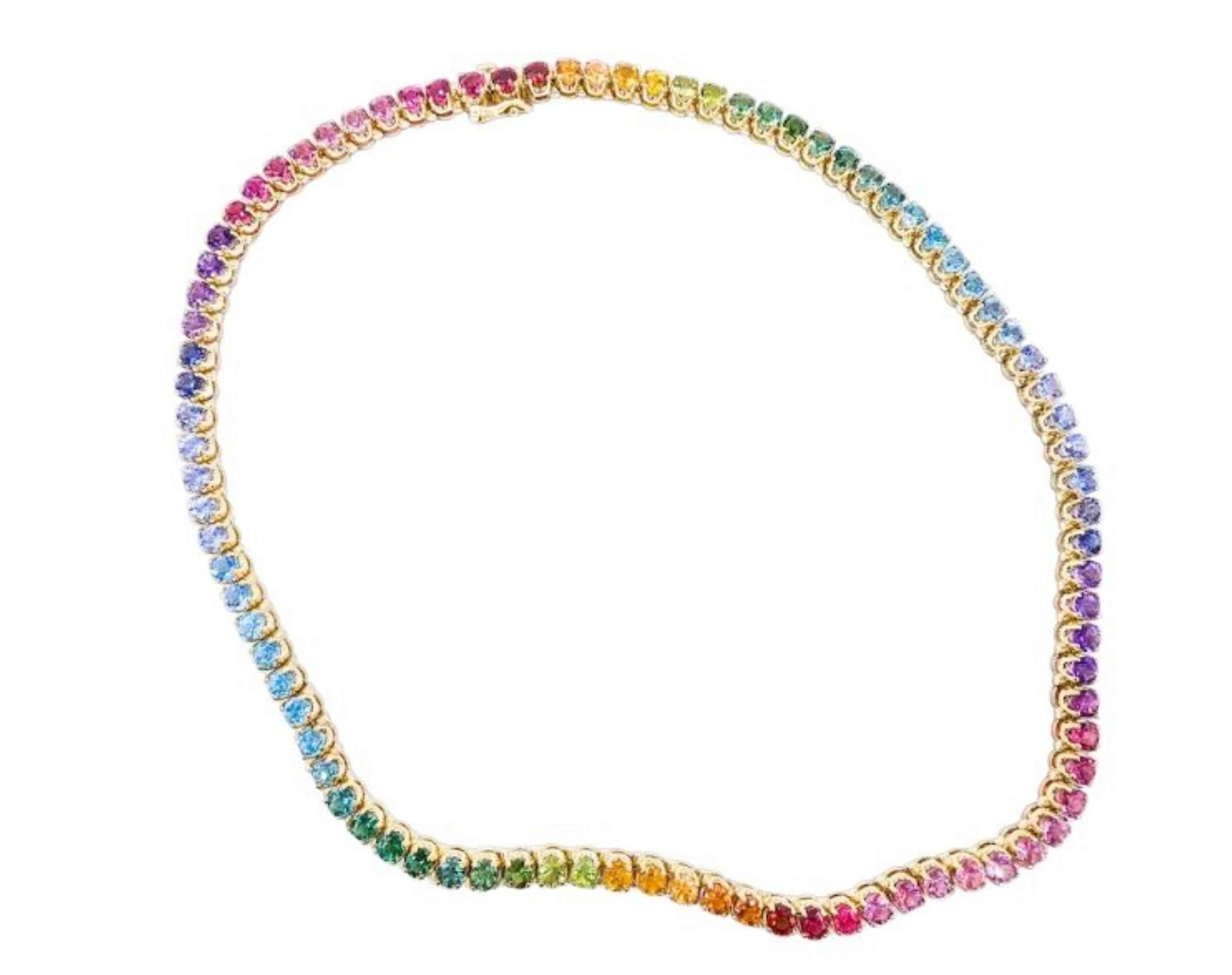 Luxuriöse Tennis-Halskette mit mehreren Edelsteinen aus 14k Gelbgold

Wir stellen Ihnen diese exquisite Edelstein-Tennis-Halskette vor, die sorgfältig aus 14-karätigem Gelbgold gefertigt ist. Die Kette besteht aus 18 Karat runden, mehrfarbigen
