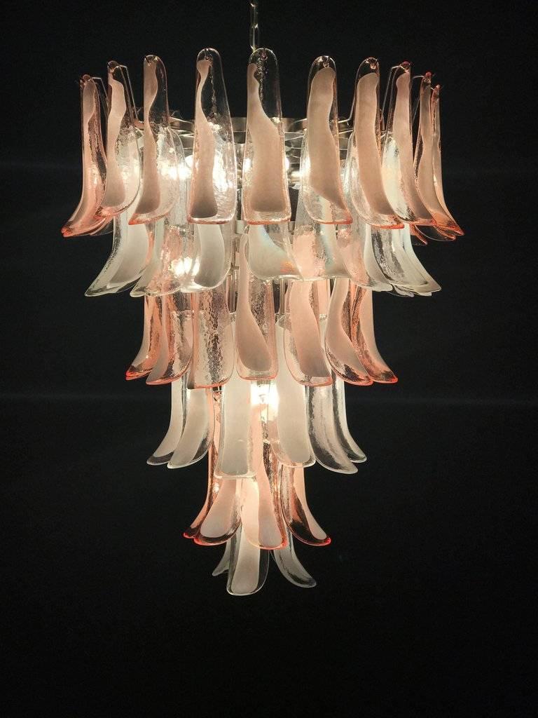 Made by 75 pink and white lattimo glasses.
Available six pieces.
Chrome frame with 13 E 14 light bulbs.
Measure: Height with chain cm 170 without chain cm 105. Diameter cm 80.
We can rewire for US standards.
 