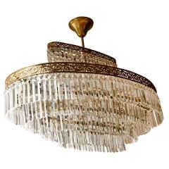 Luxurious Oval Shaped Crystal and Brass Hollywood Regency Chandelier