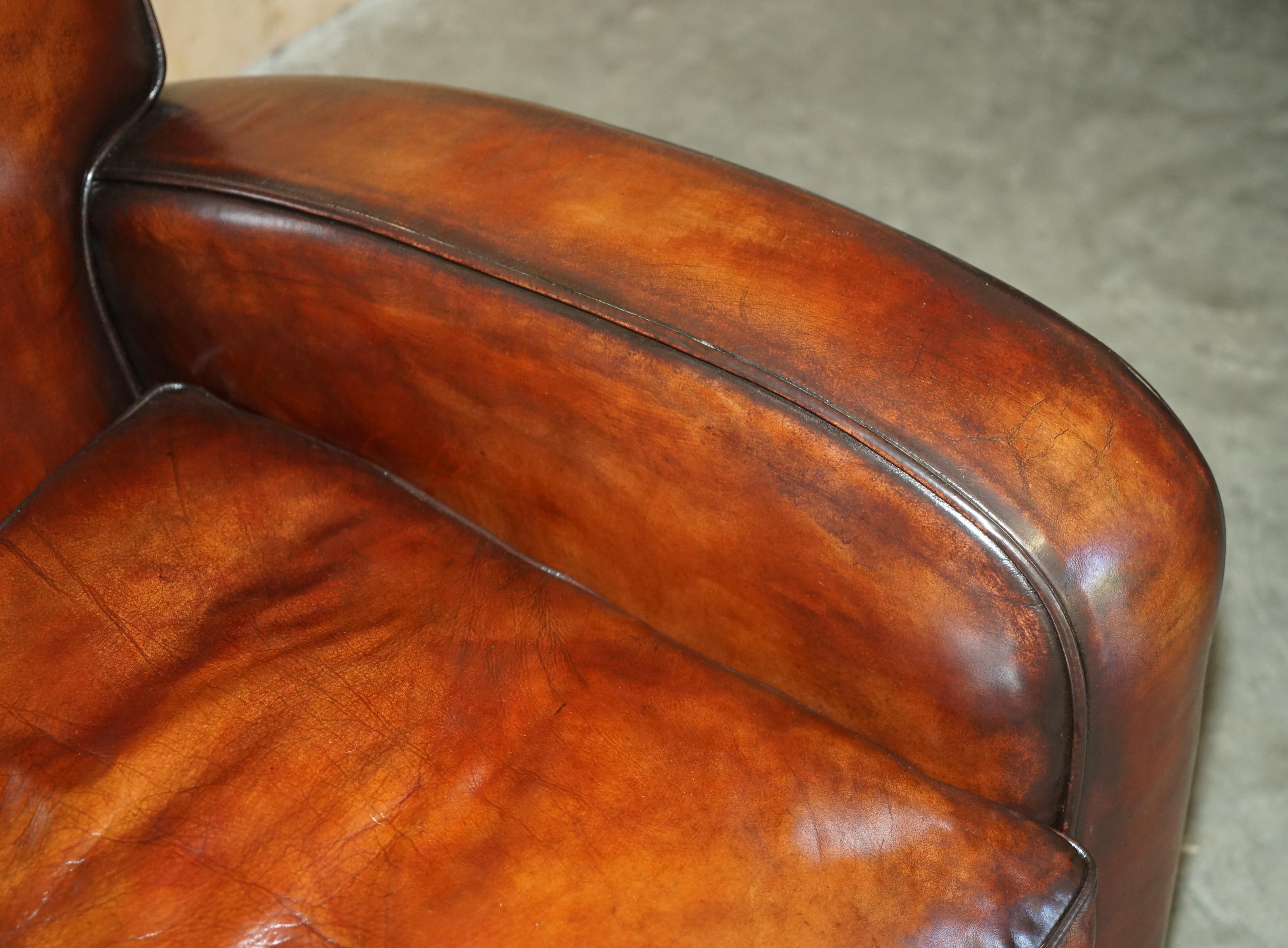 XX secolo LUXURIOUS PAIR OF ART DECO FULLY RESTORED CIGAR BROWN LEATHER ARMCHAIRs in vendita