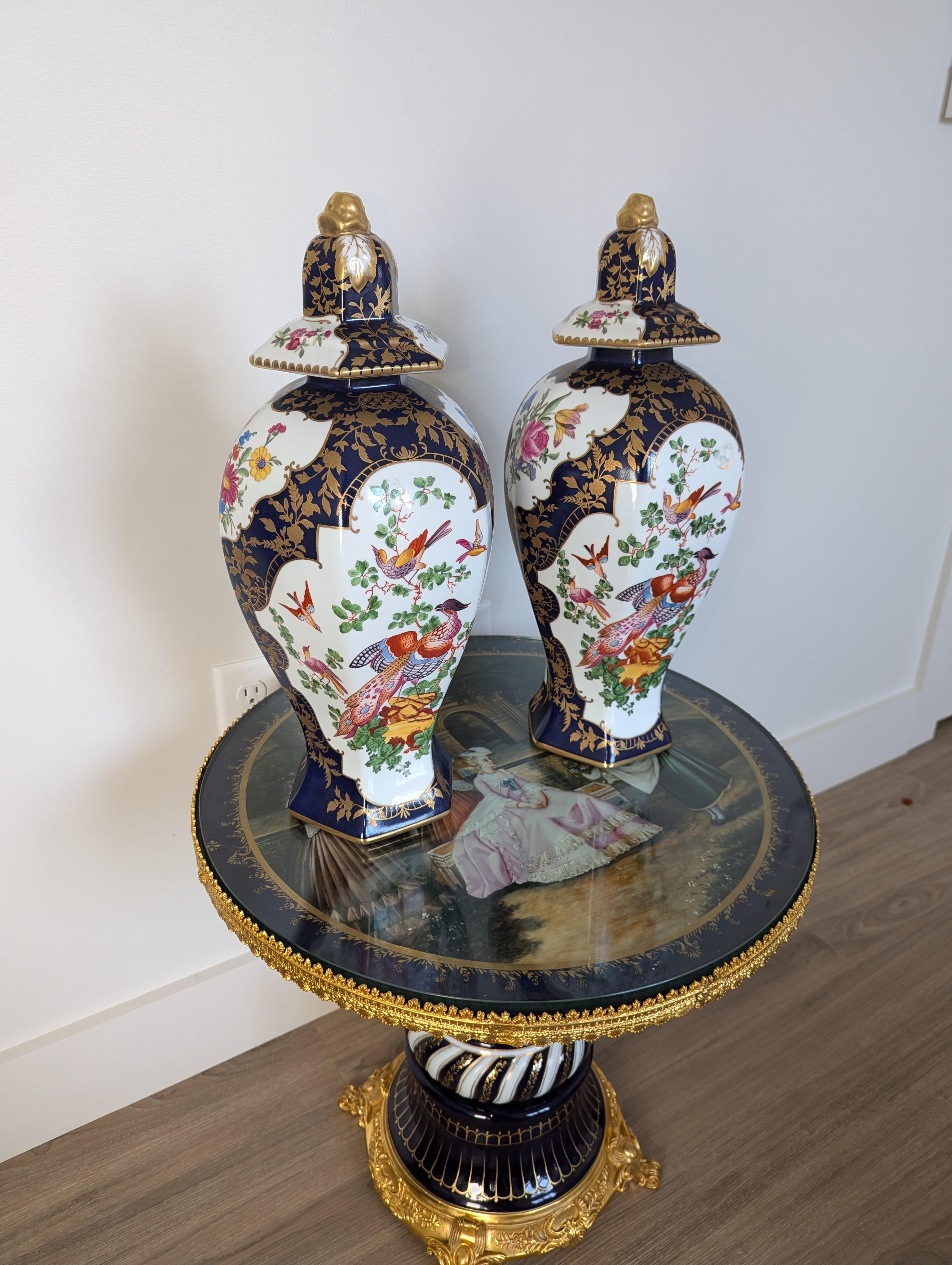 Central American Luxurious Pair Of Cobalt Blue & Floral Gilt Chelsea House Peacock Urns For Sale