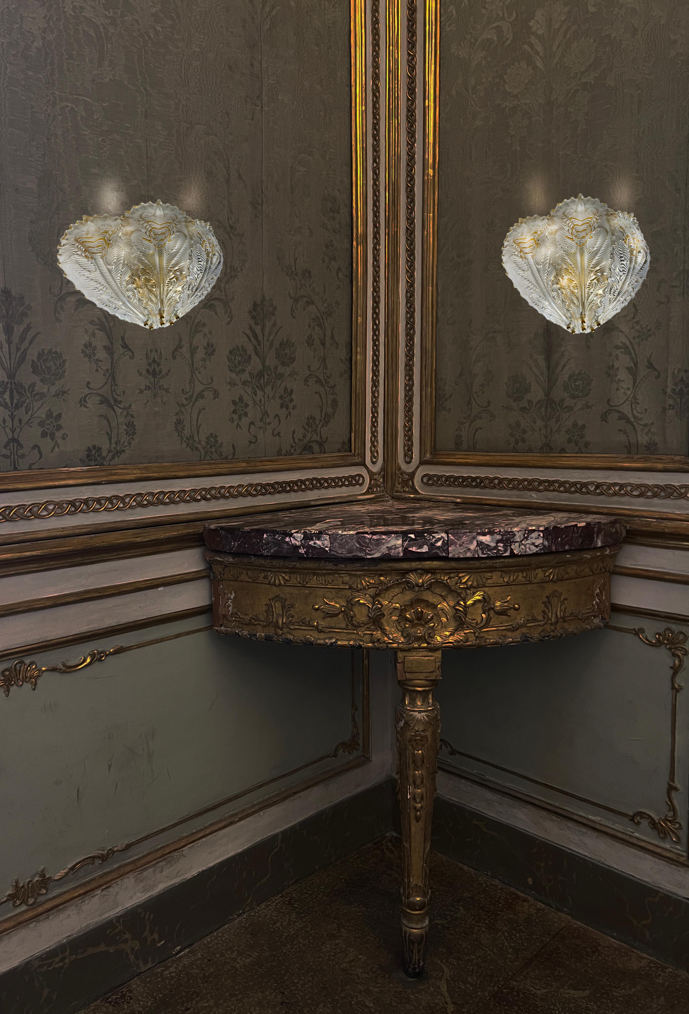 Gorgeous pair of sconces with gold inclusions. Quite large and extremely elegant. Perfect glass pieces of high quality manufacture. Rare to find. A similar smaller pair also available, if interested, please contact us for price and photos.