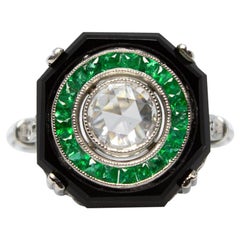 Luxurious Platinum Diamond, Onyx and Emerald Halo Ring