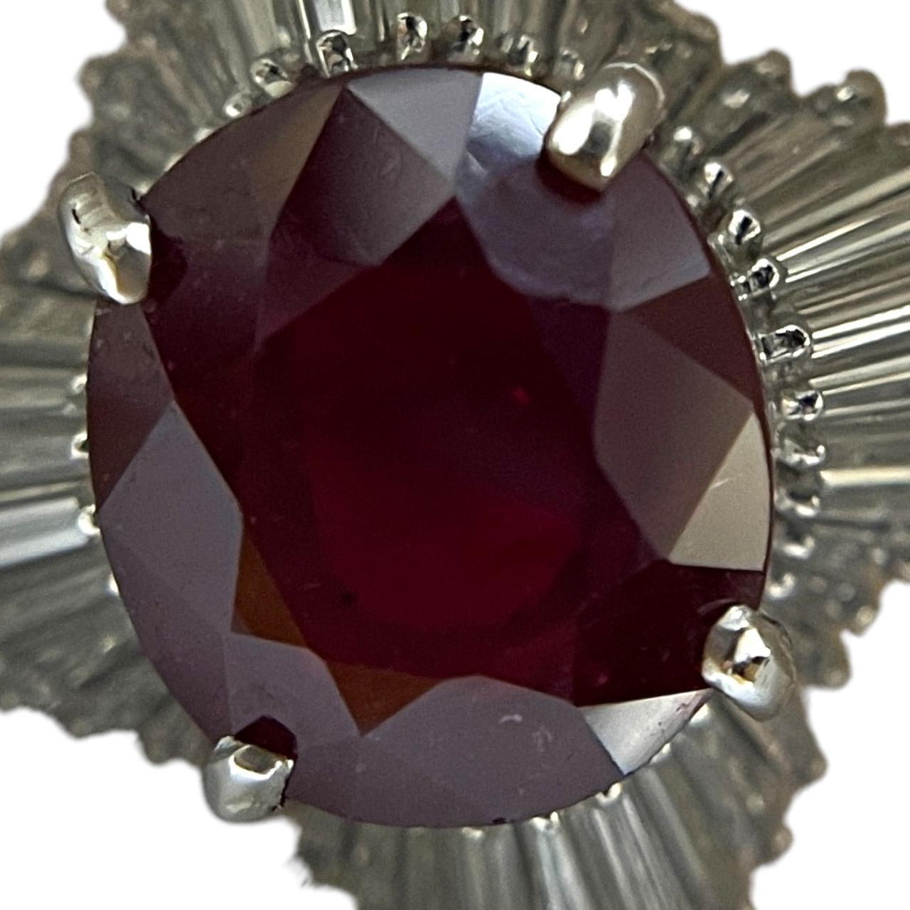 Modern Luxurious Platinum IGI Appraised 8.08 Carat Ruby and 1.84 Ct Diamond Halo Ring
