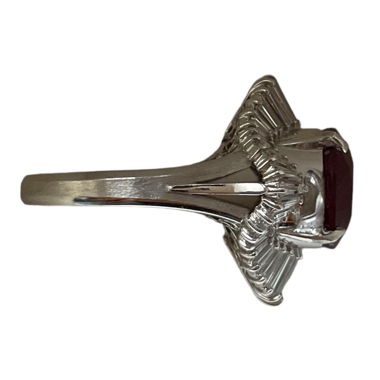 Oval Cut Luxurious Platinum IGI Appraised 8.08 Carat Ruby and 1.84 Ct Diamond Halo Ring