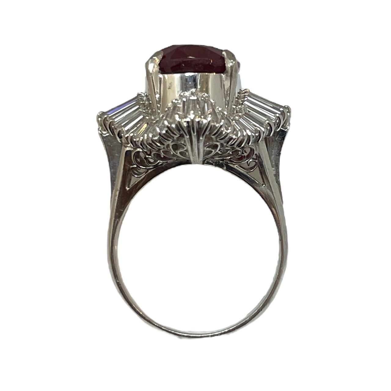 Luxurious Platinum IGI Appraised 8.08 Carat Ruby and 1.84 Ct Diamond Halo Ring In New Condition In New York, NY