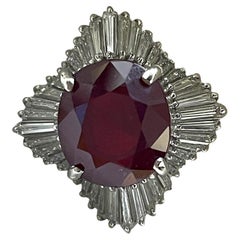 Luxurious Platinum IGI Appraised 8.08 Carat Ruby and 1.84 Ct Diamond Halo Ring