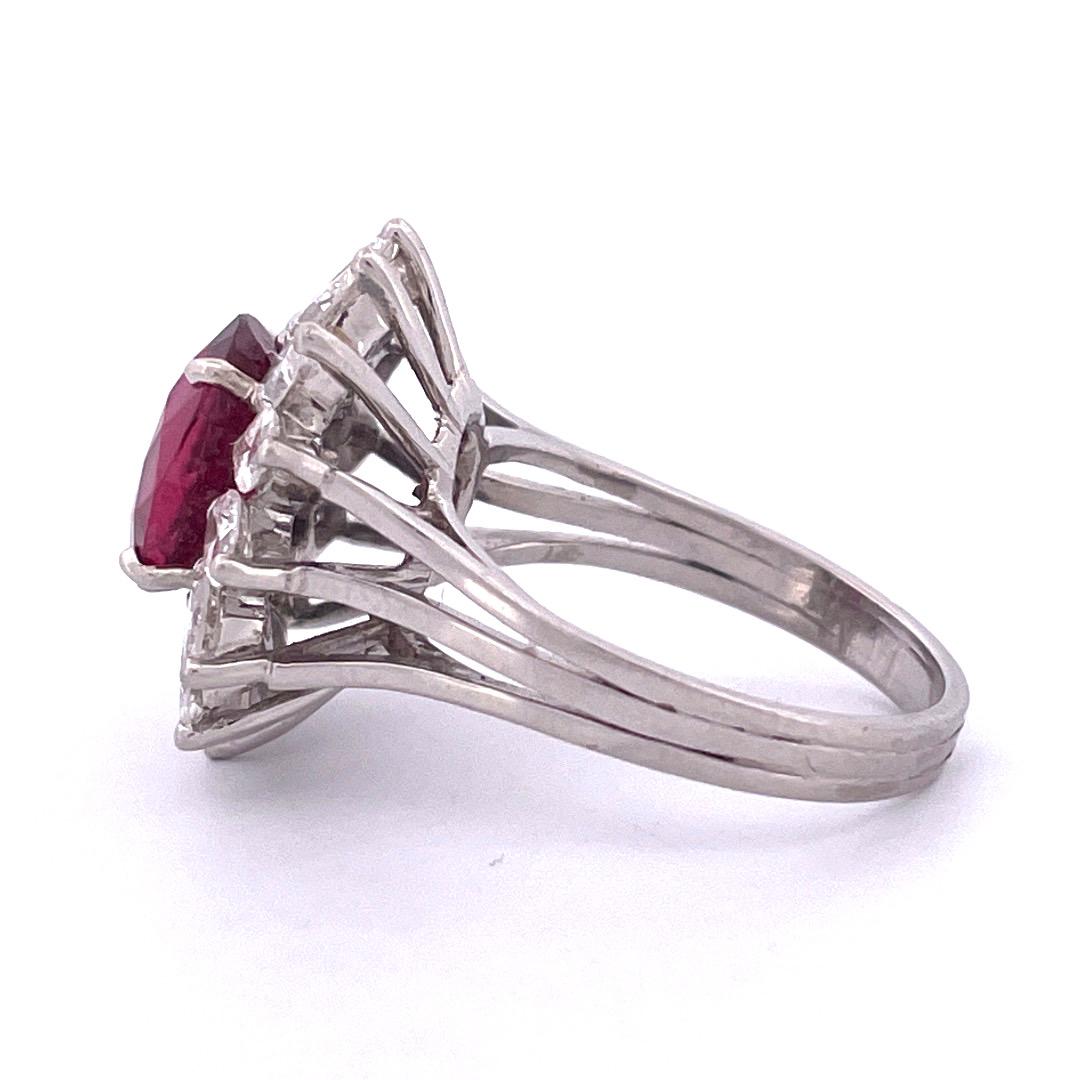 Oval Cut Luxurious Platinum Ruby and Diamond Ring For Sale