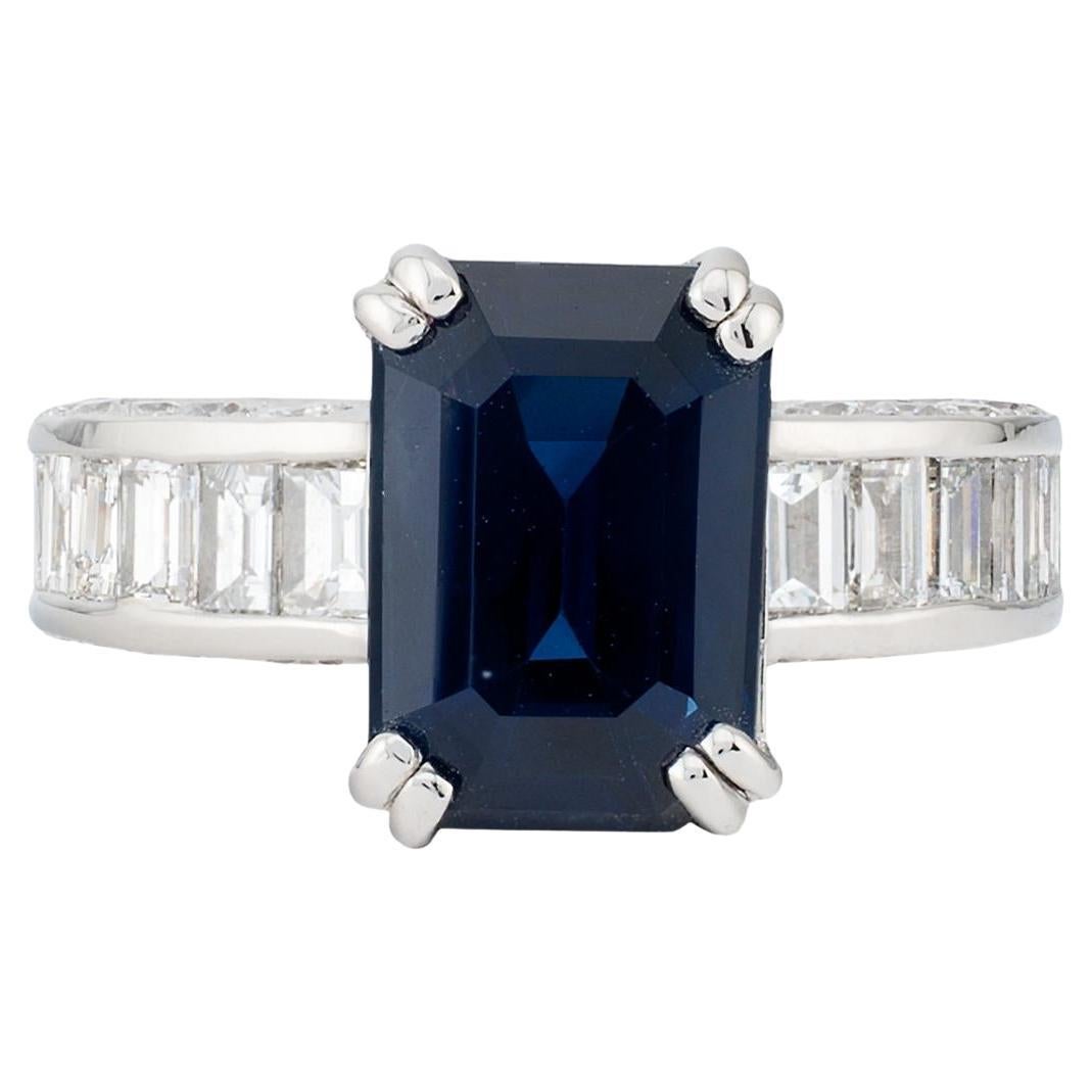 Luxurious Royal Blue Emerald Cut Sapphire & Baguette Diamond Ring in Platinum