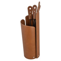 Luxurious set of fireplace accessories in steel and leather ALERY