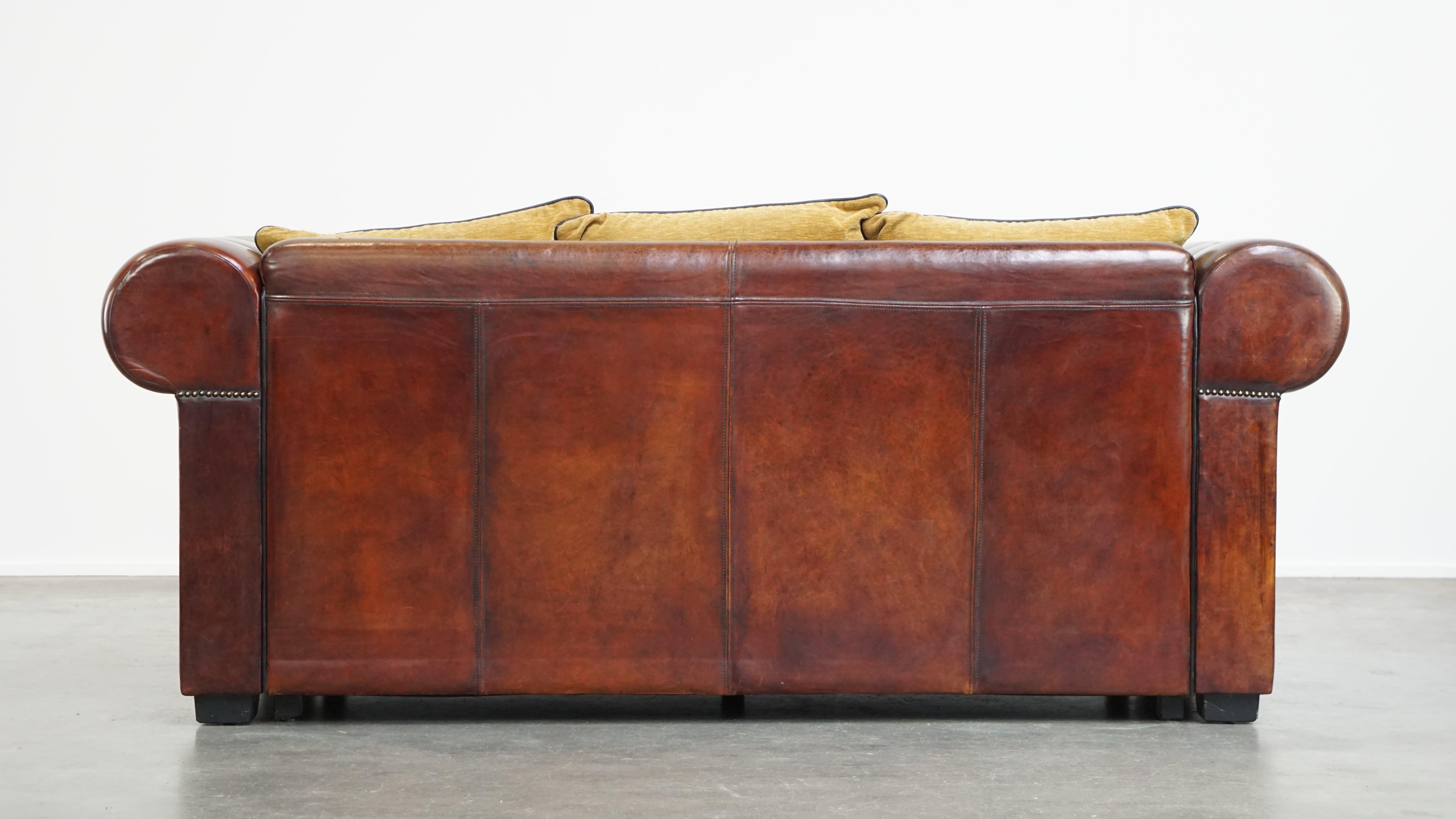 Hand-Crafted Luxurious, spacious two-seater top quality sheepskin sofa with fabric cushions For Sale