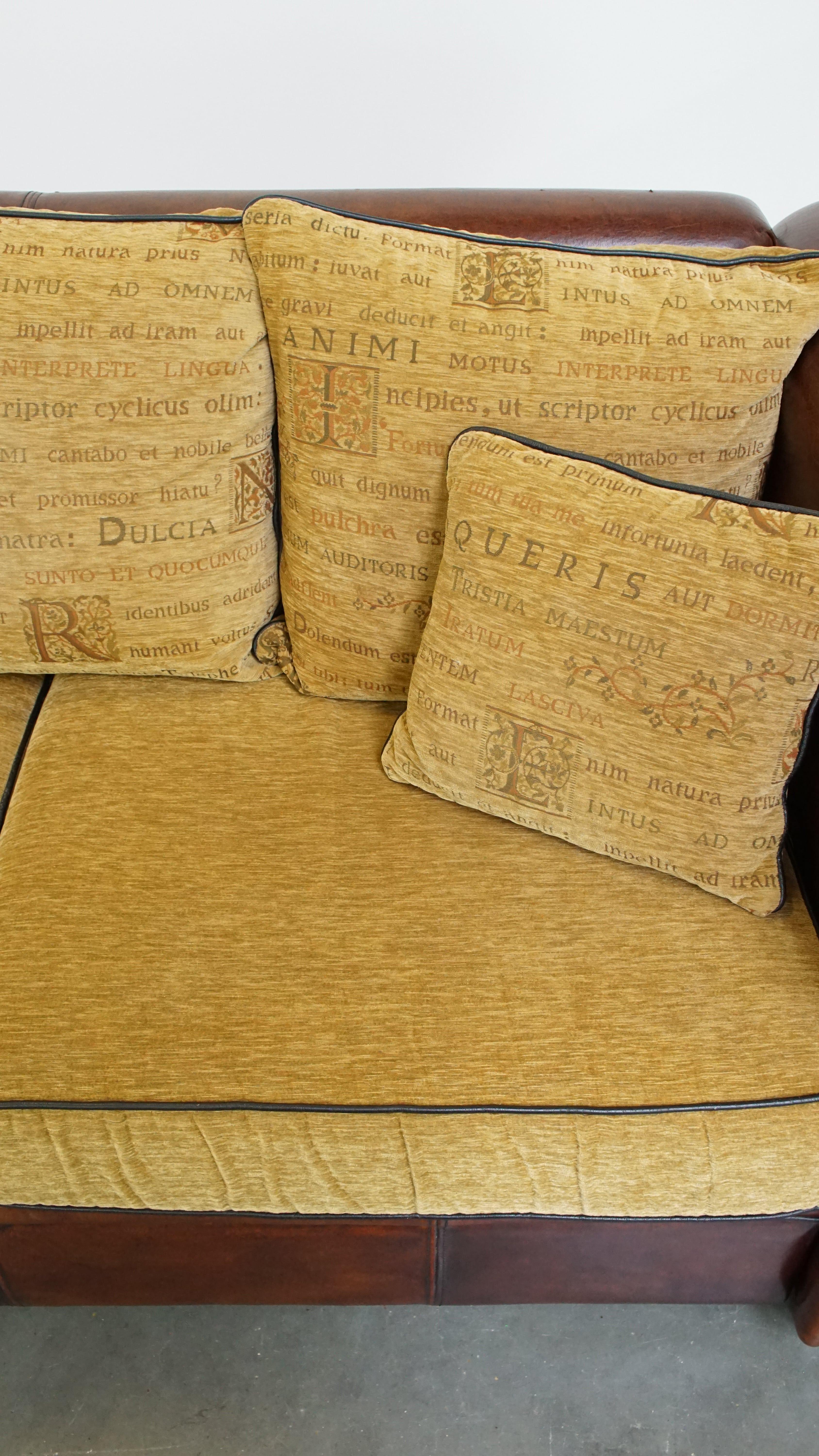 Luxurious, spacious two-seater top quality sheepskin sofa with fabric cushions For Sale 2