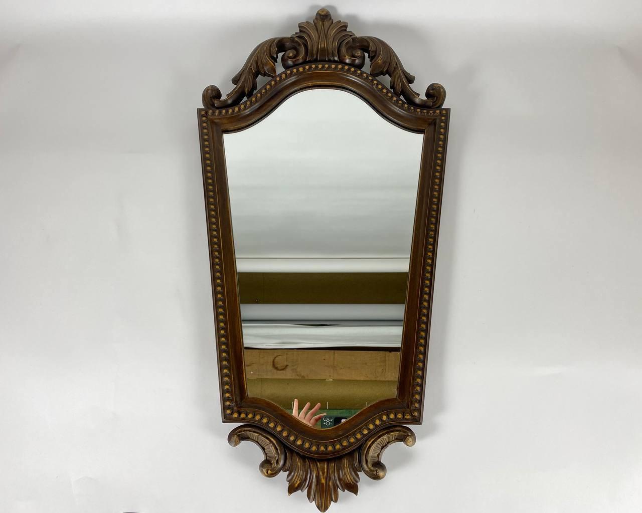 Empire Style vintage wall mirror in a beautiful wooden frame. Belgium.

A mirror is an important accessory for any room. This model has a luxurious design that will add individuality to the interior. 

Echoing the refined palatial style of the