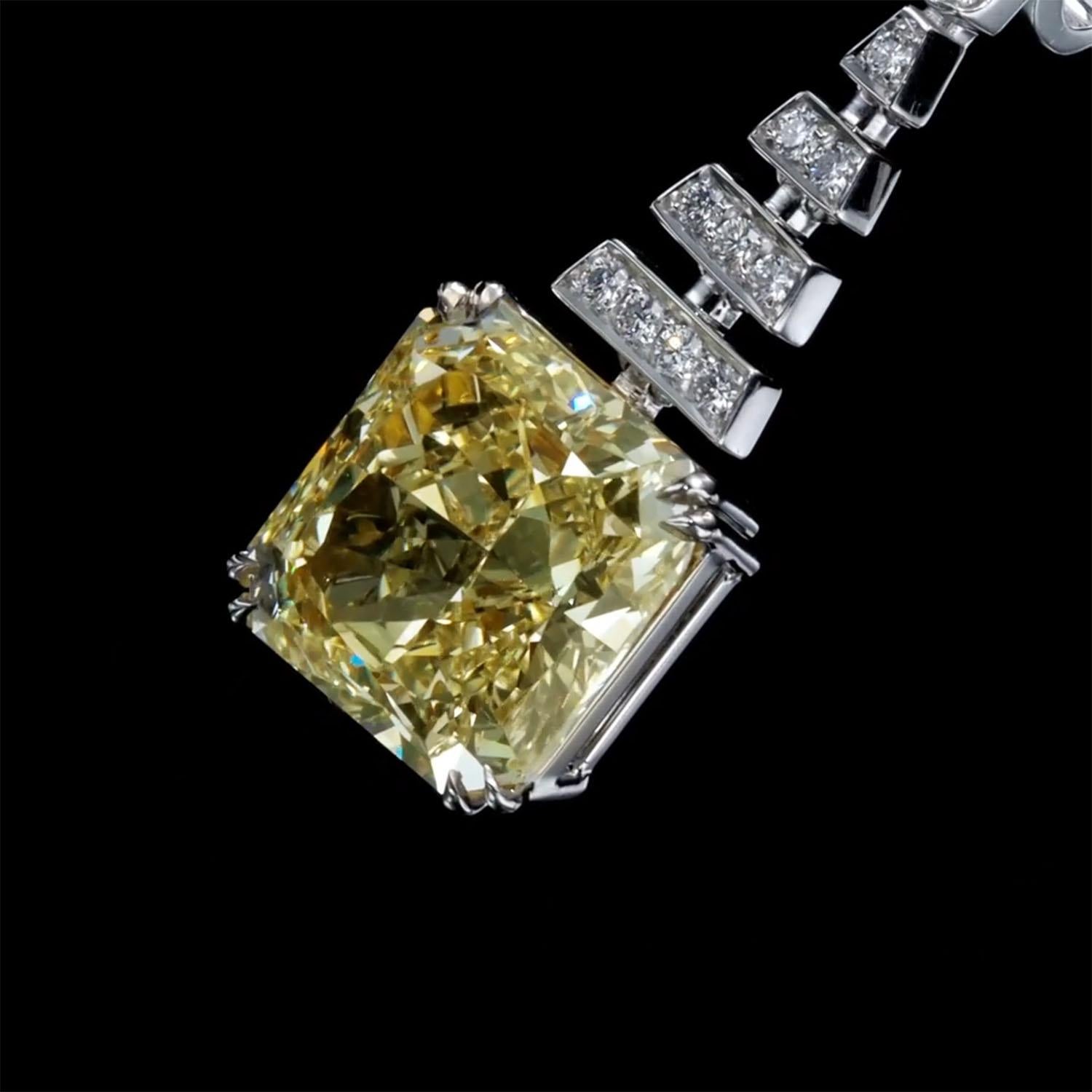 Luxury 14.12 Carat Fancy Yellow Diamond Earrings, GIA, Drop Diamond Earrings In New Condition For Sale In Ramat Gan, IL