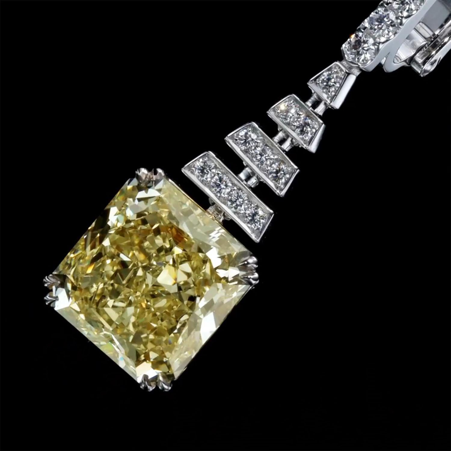 Women's Luxury 14.12 Carat Fancy Yellow Diamond Earrings, GIA, Drop Diamond Earrings For Sale