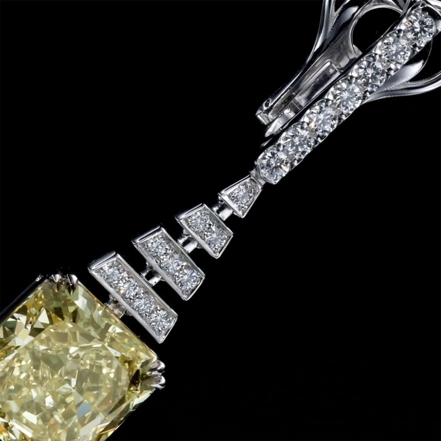 Luxury 14.12 Carat Fancy Yellow Diamond Earrings, GIA, Drop Diamond Earrings For Sale 2