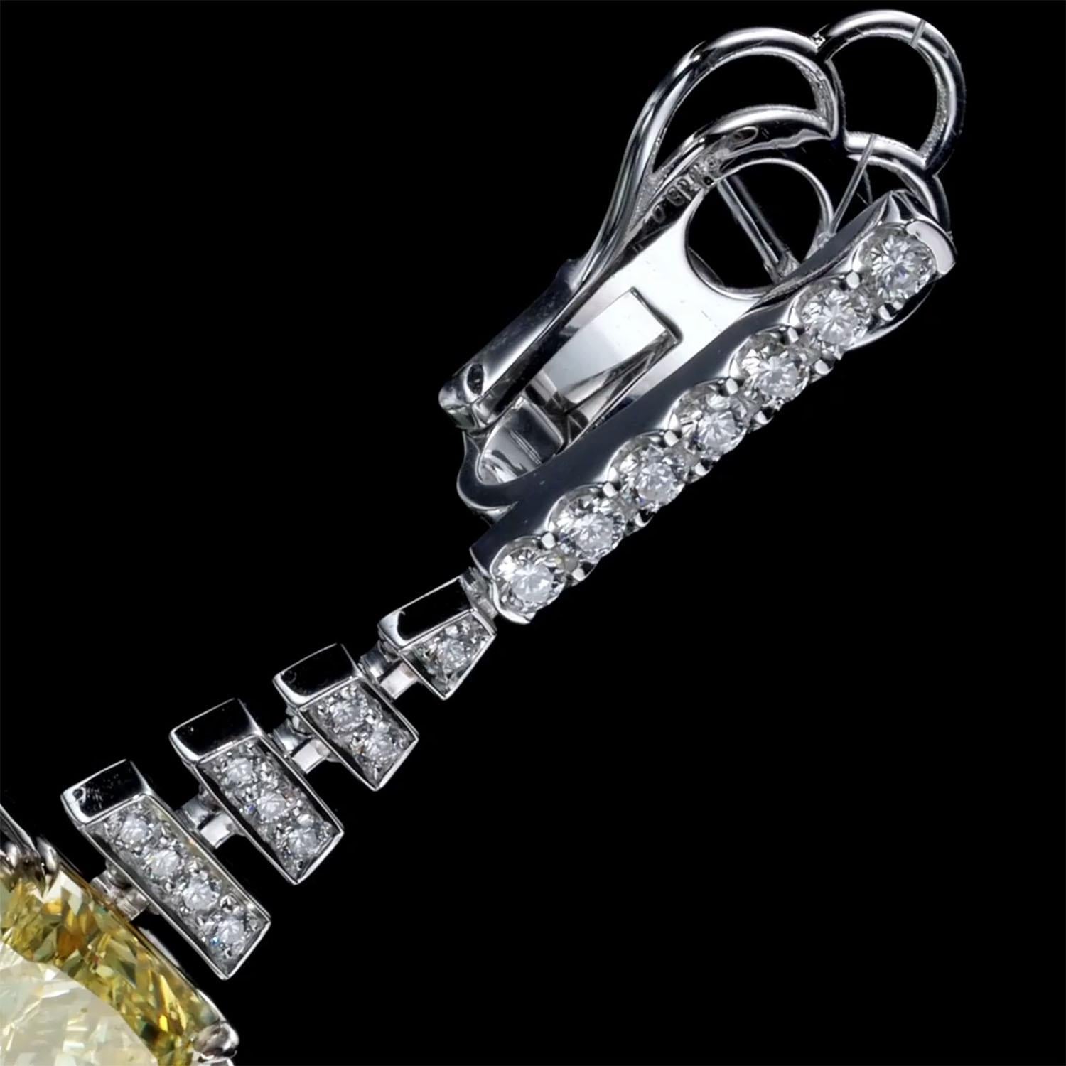 Luxury 14.12 Carat Fancy Yellow Diamond Earrings, GIA, Drop Diamond Earrings For Sale 3