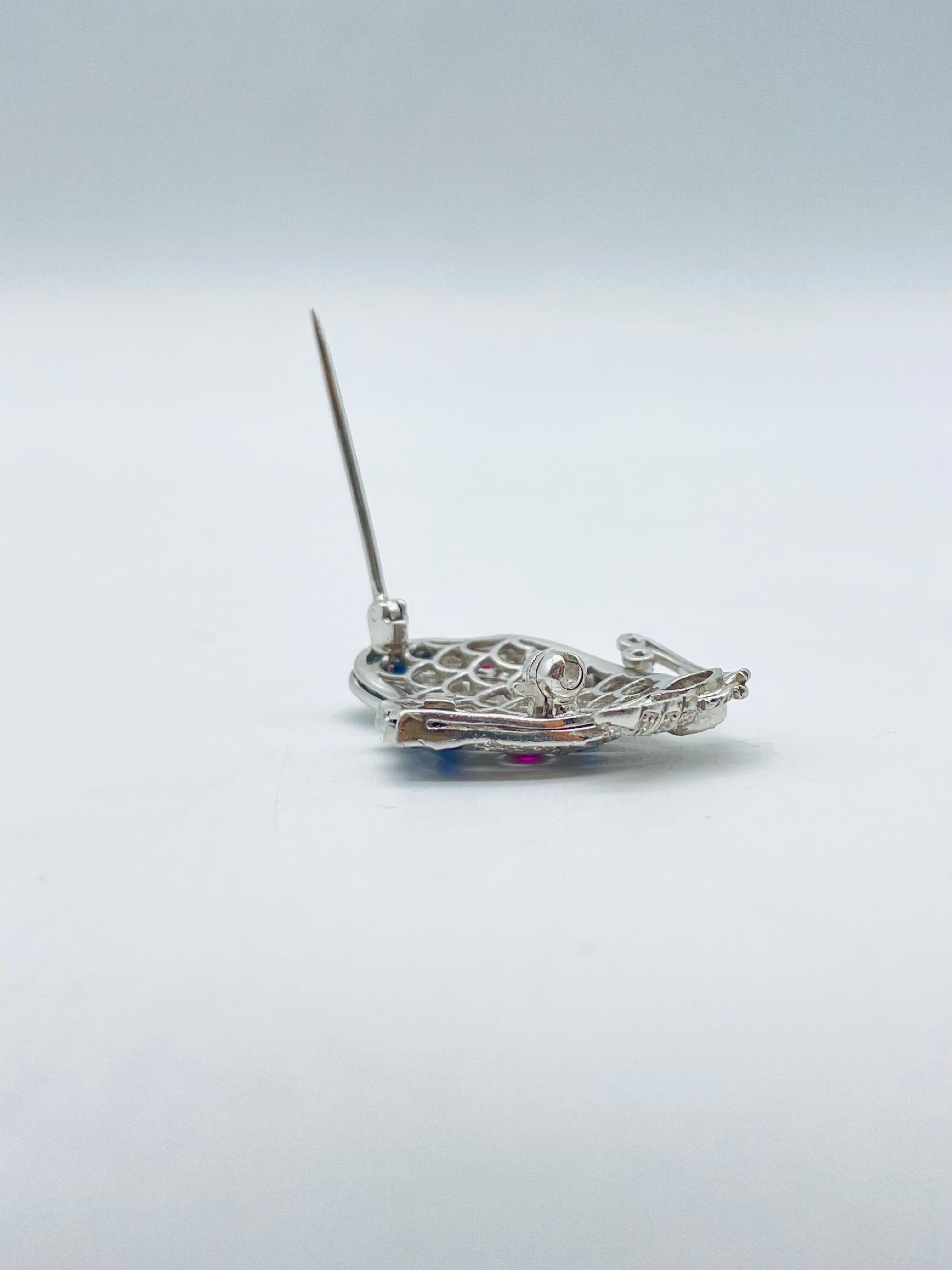 Luxury 18k white gold brooch with diamonds, sapphires and rubies iced out For Sale 10