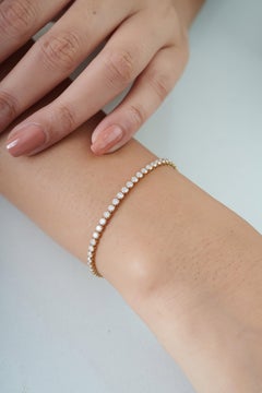 Bracelet « tennis » de luxe serti de diamants ronds taille brillant d'un poids total de 3,49 carats, en or jaune massif 14 carats