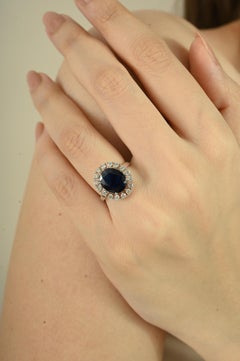 Luxury 4.5 Carat Deep Blue Sapphire and Diamond Halo Cocktail Ring in 18k Gold