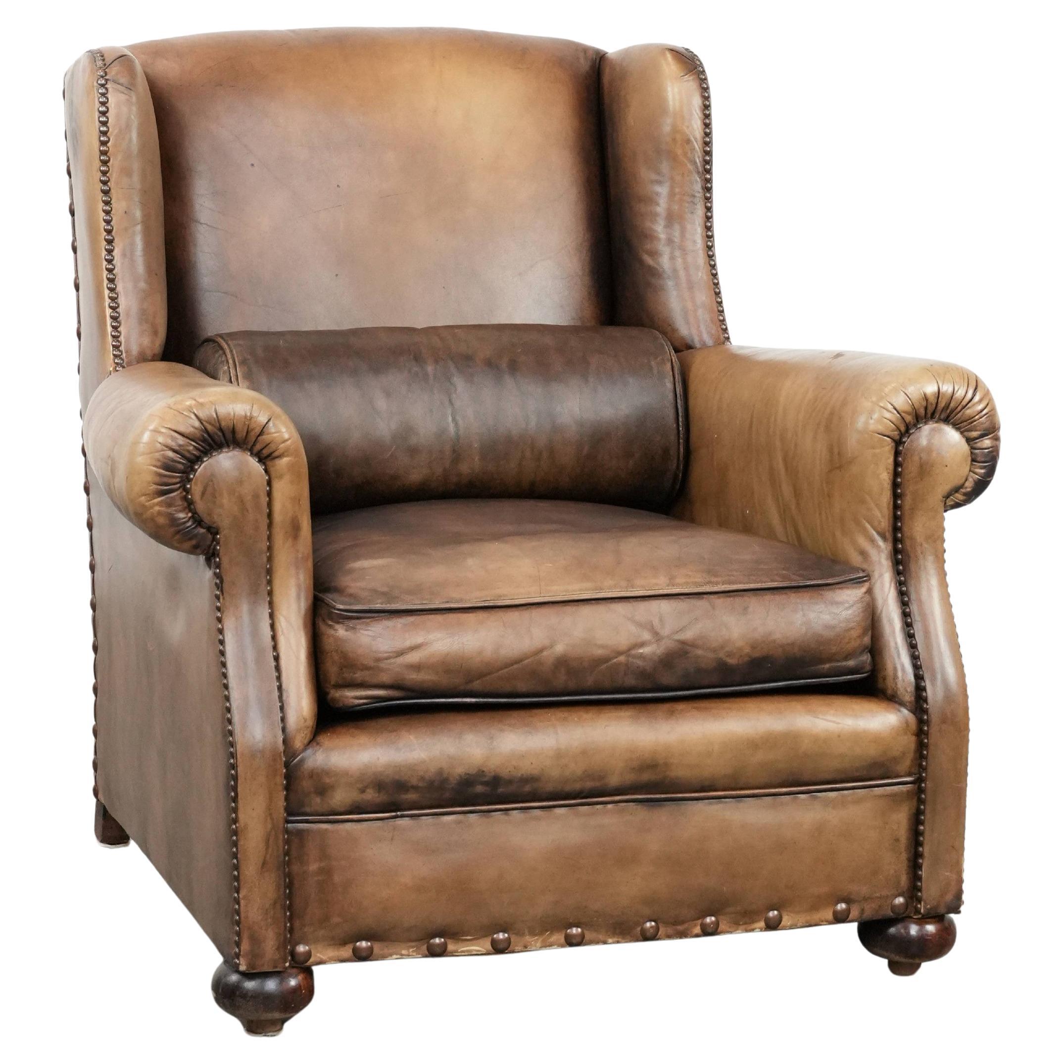 Luxury and large cowhide leather wingback chair in English style For Sale