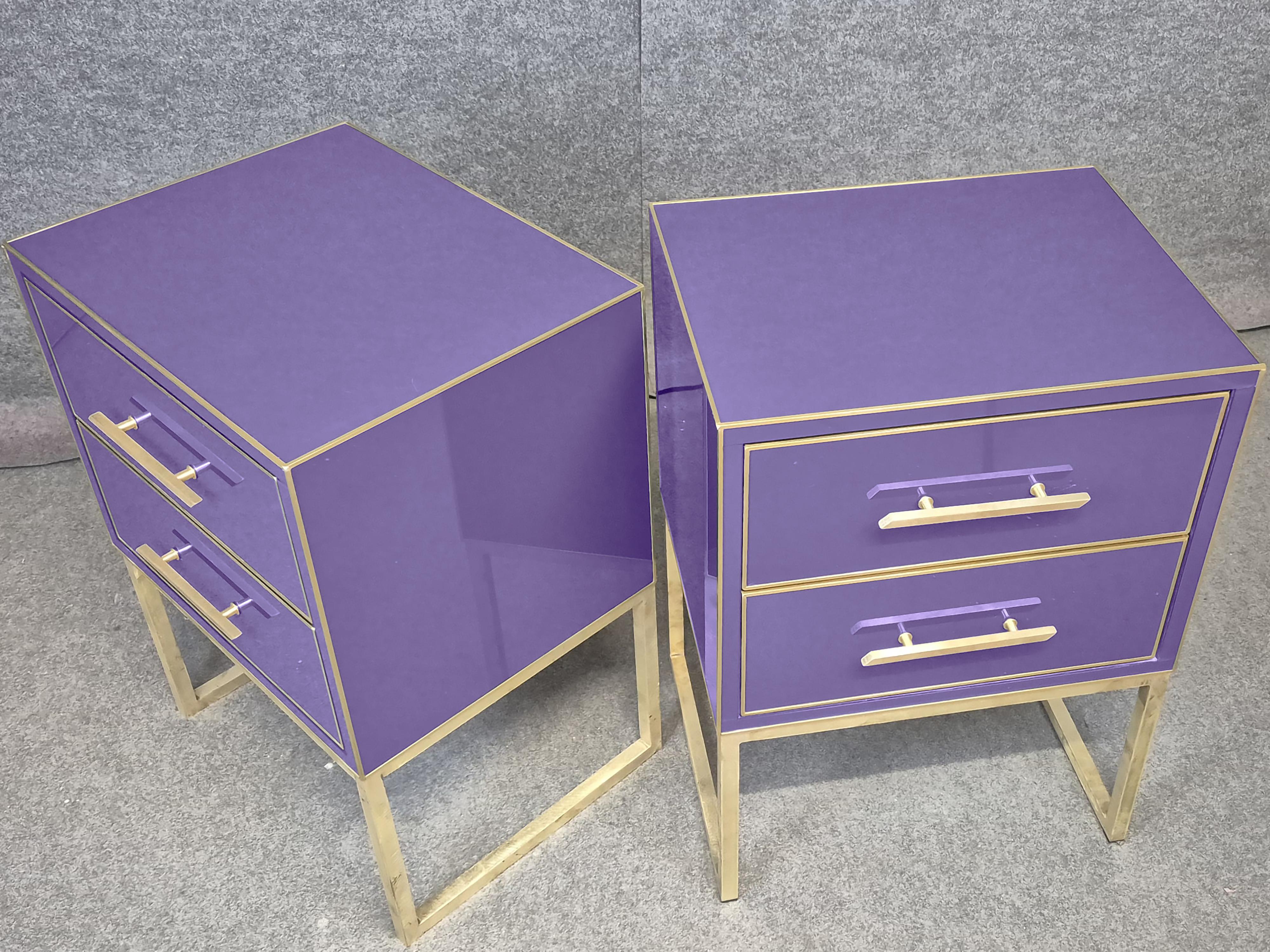 Luxurious bedside tables in purple glass, solid wood and brass edges bring Italian art and sophistication to your bedroom.

These exclusive bedside tables, crafted in Italy, feature Murano glass in a striking purple hue, complemented by solid wood
