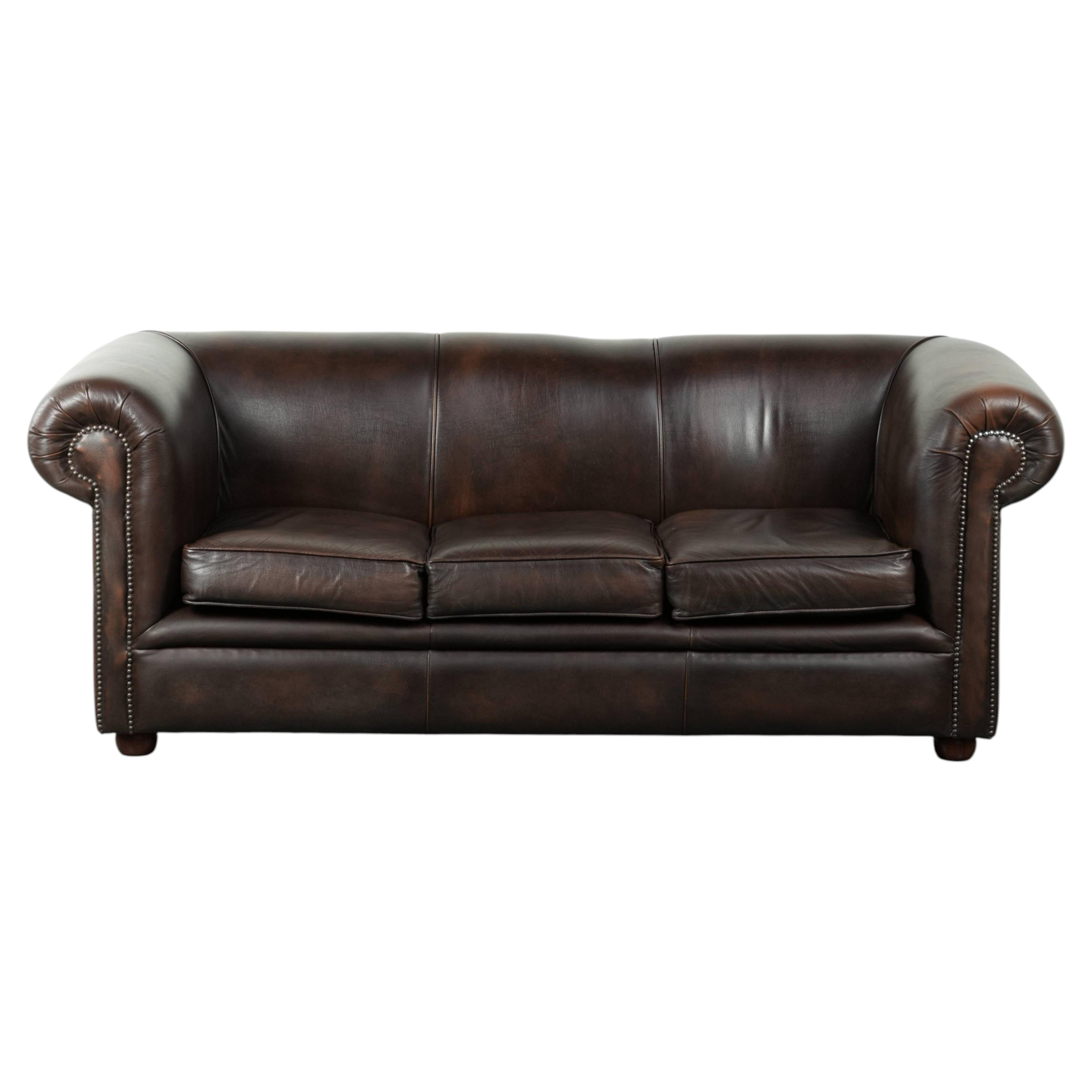 Luxury brown smooth cow leather Chesterfield sofa with an English look For Sale