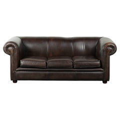 Luxury brown smooth cow leather Chesterfield sofa with an English look