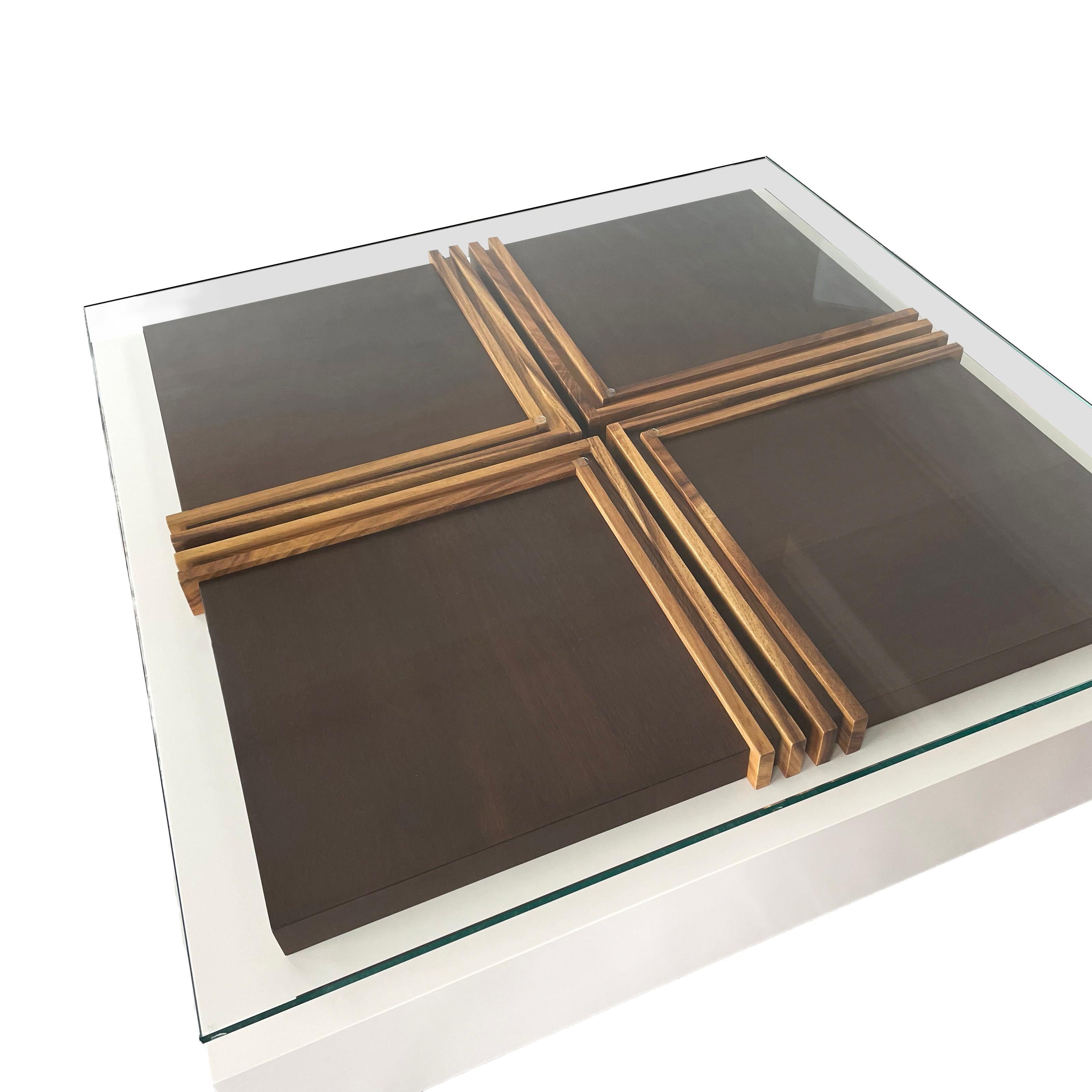Añade un toque de sofisticación y estilo moderno a tu salón con esta impresionante mesa de centro contemporánea. Mezcla perfecta de líneas limpias y materiales elegantes, esta mesa sirve tanto de pieza funcional como de elegante punto focal en