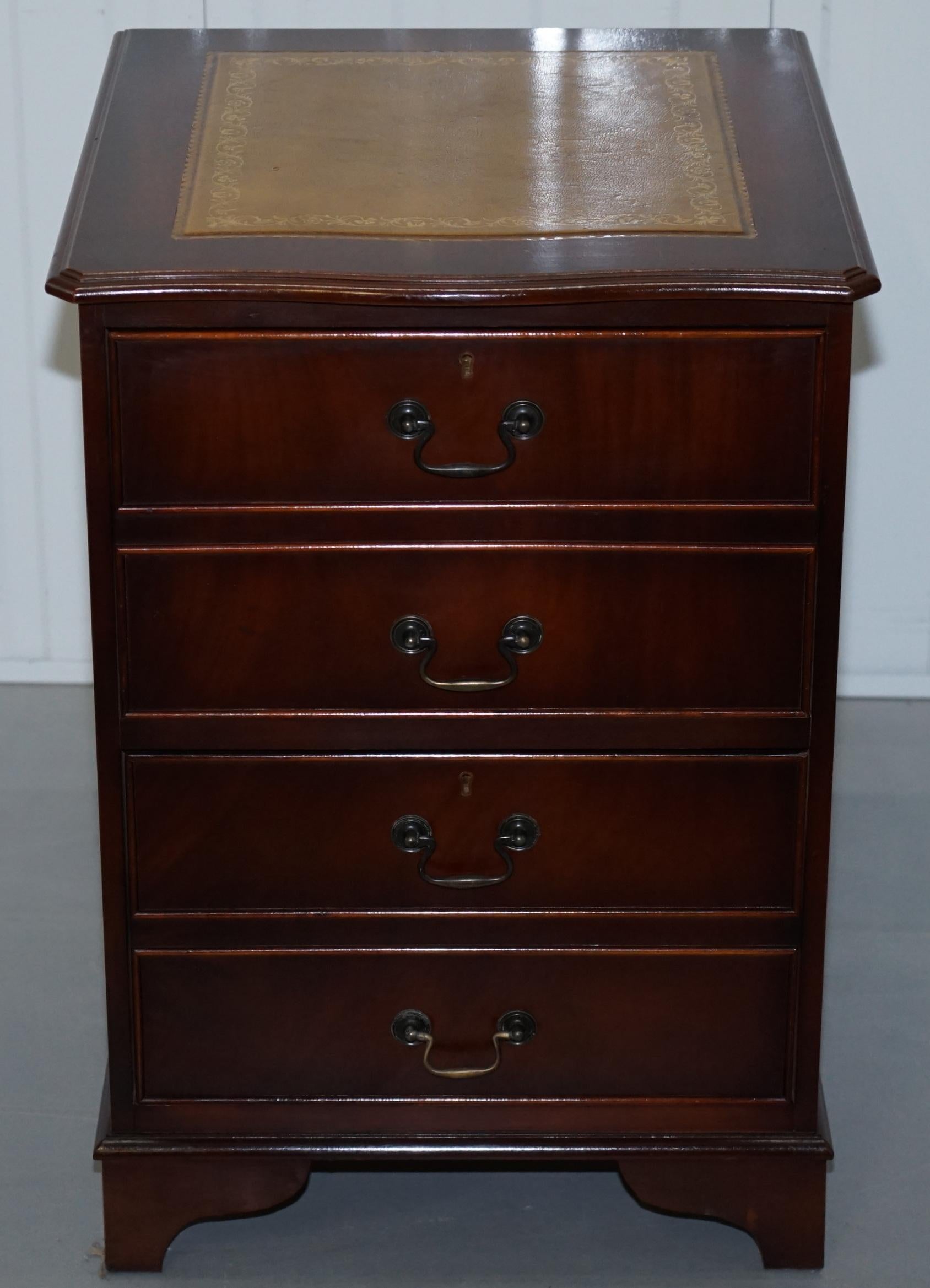 We are delighted to offer for sale this lovely curved front mahogany with green leather writing surface filing cabinet

The front panel is as mentioned curved outwards and offers a nice little break from the norm

The green leather writing