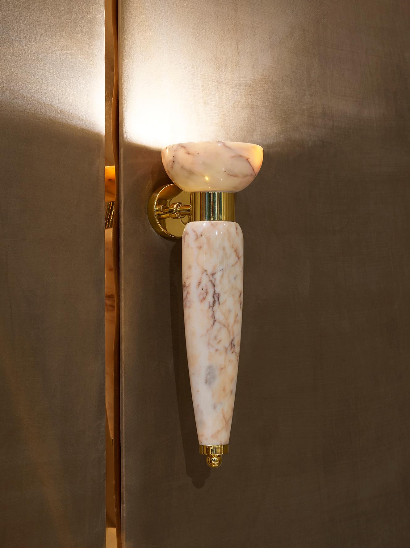 The Luxury Estremoz marble wall lamp is ideal for lovers of lighting, in fact a necessity. To suit both classic or contemporary interiors, owing to its beauty. Adding the utmost in glamour, the epitome of outstanding style. Striking in pairs, but