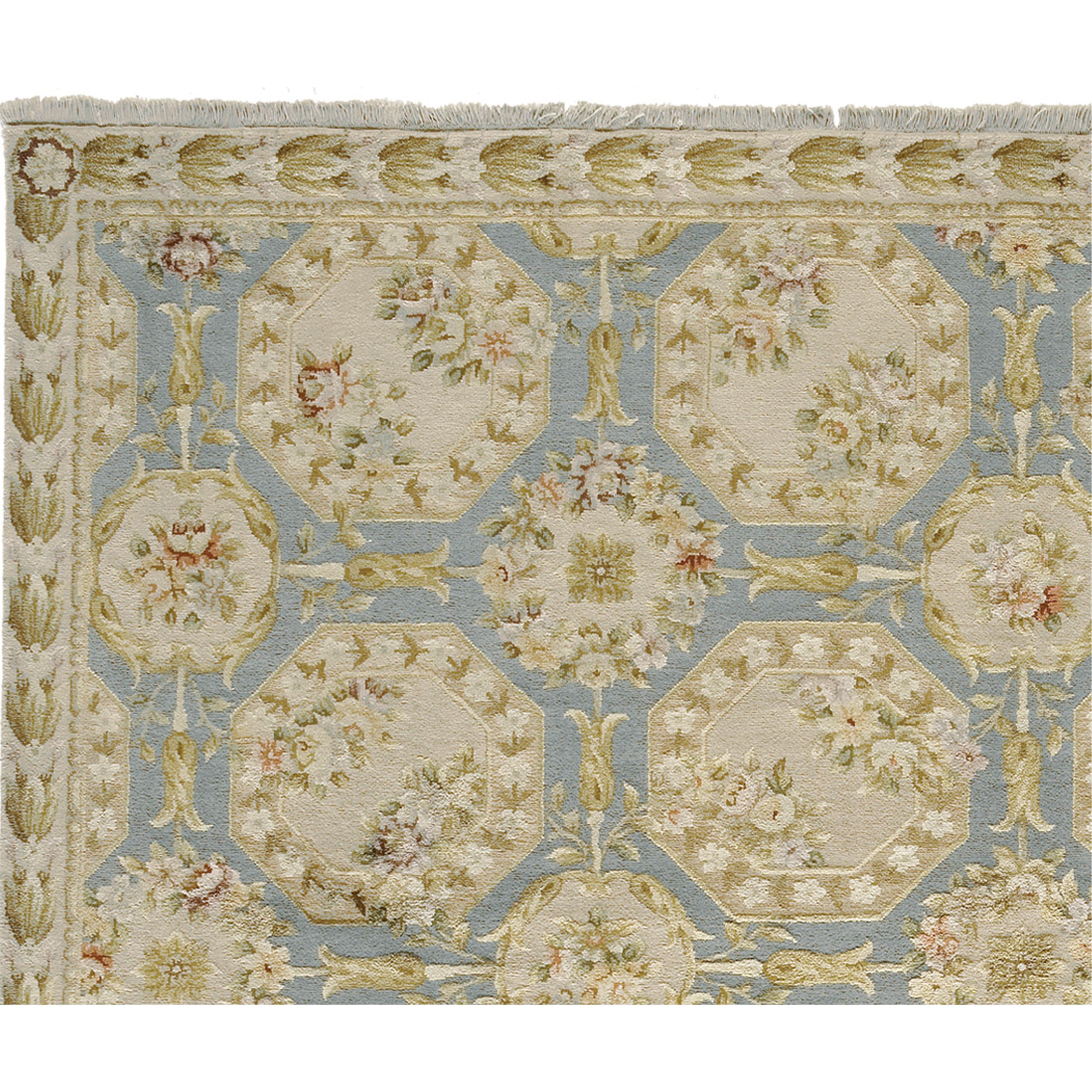 Originating from the skilled craftsmanship of China, this piece is a prime example of piled carpet artistry, seamlessly blending traditional French and European design. The ground color of this carpet is formed from the rich resilient fibers of