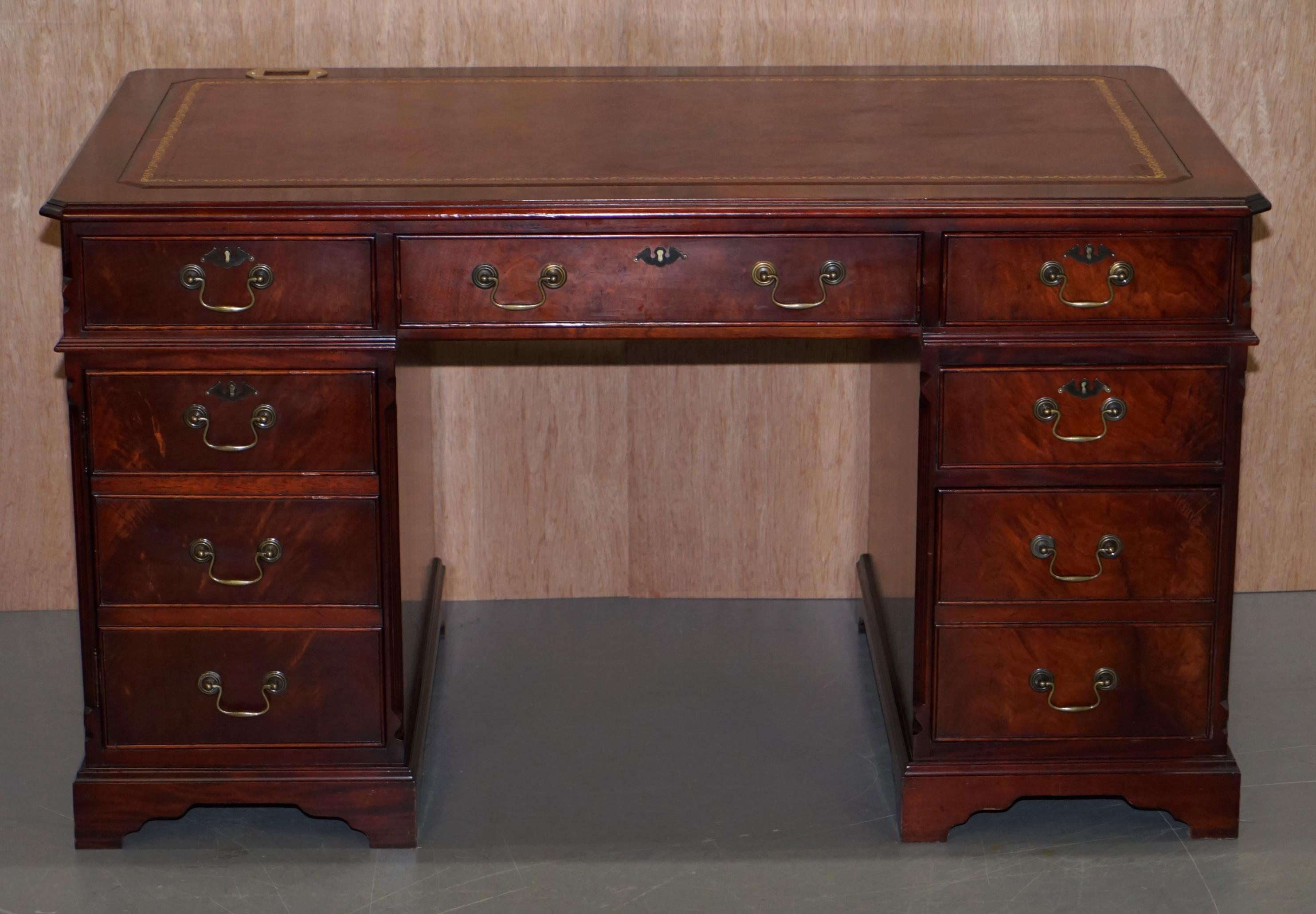 We are delighted to offer for sale this stunning custom made premium flamed mahogany with oxblood leather writing surface twin pedestal partner desk

A very good looking and well made desk, it is specially designed as mentioned to use and hide