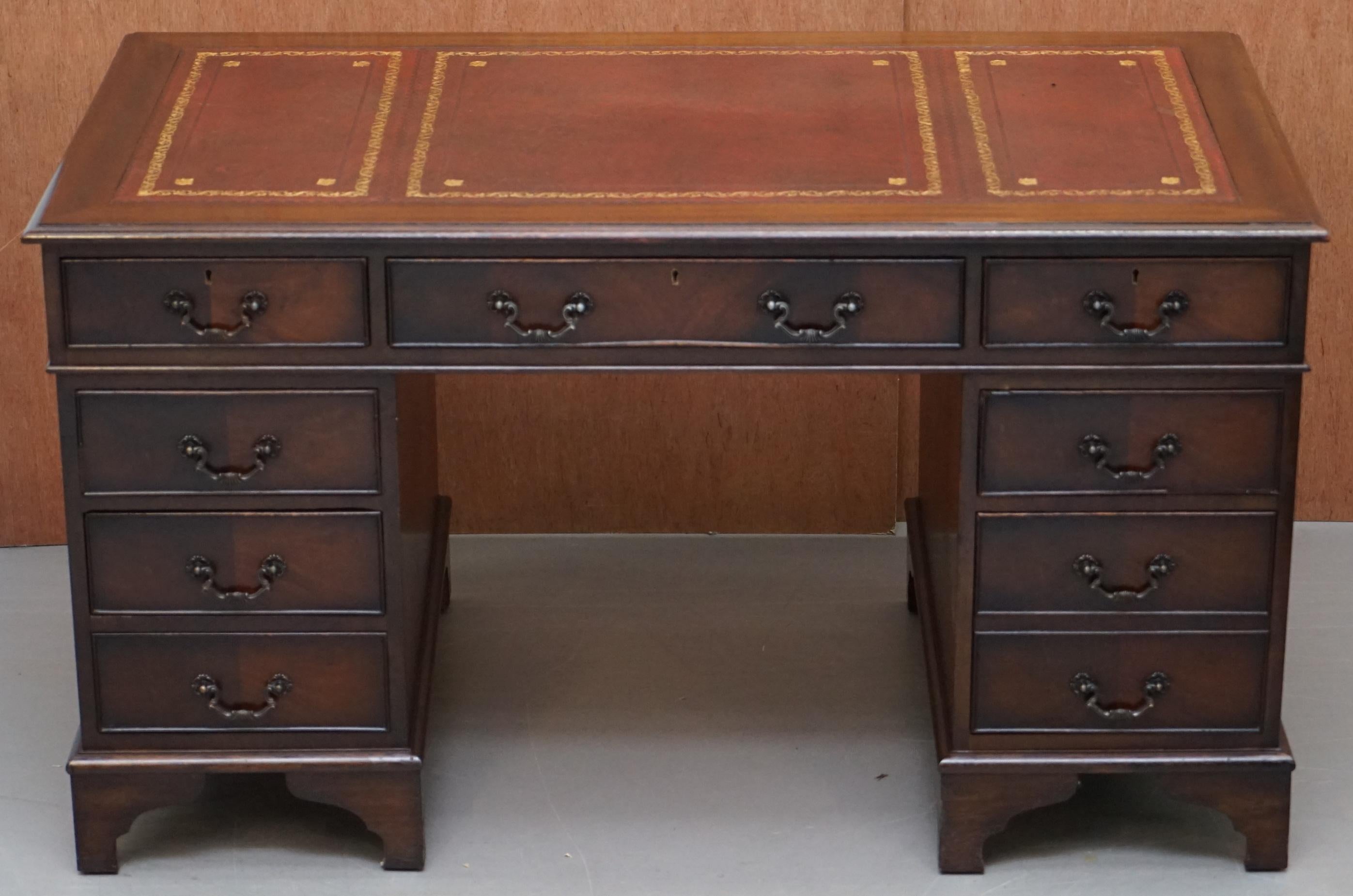 We are delighted to offer for sale this stunning custom made premium flamed mahogany with oxblood leather writing surface twin pedestal partner desk

A very good looking and well made desk, this has a luxury leather top which has extensive amounts