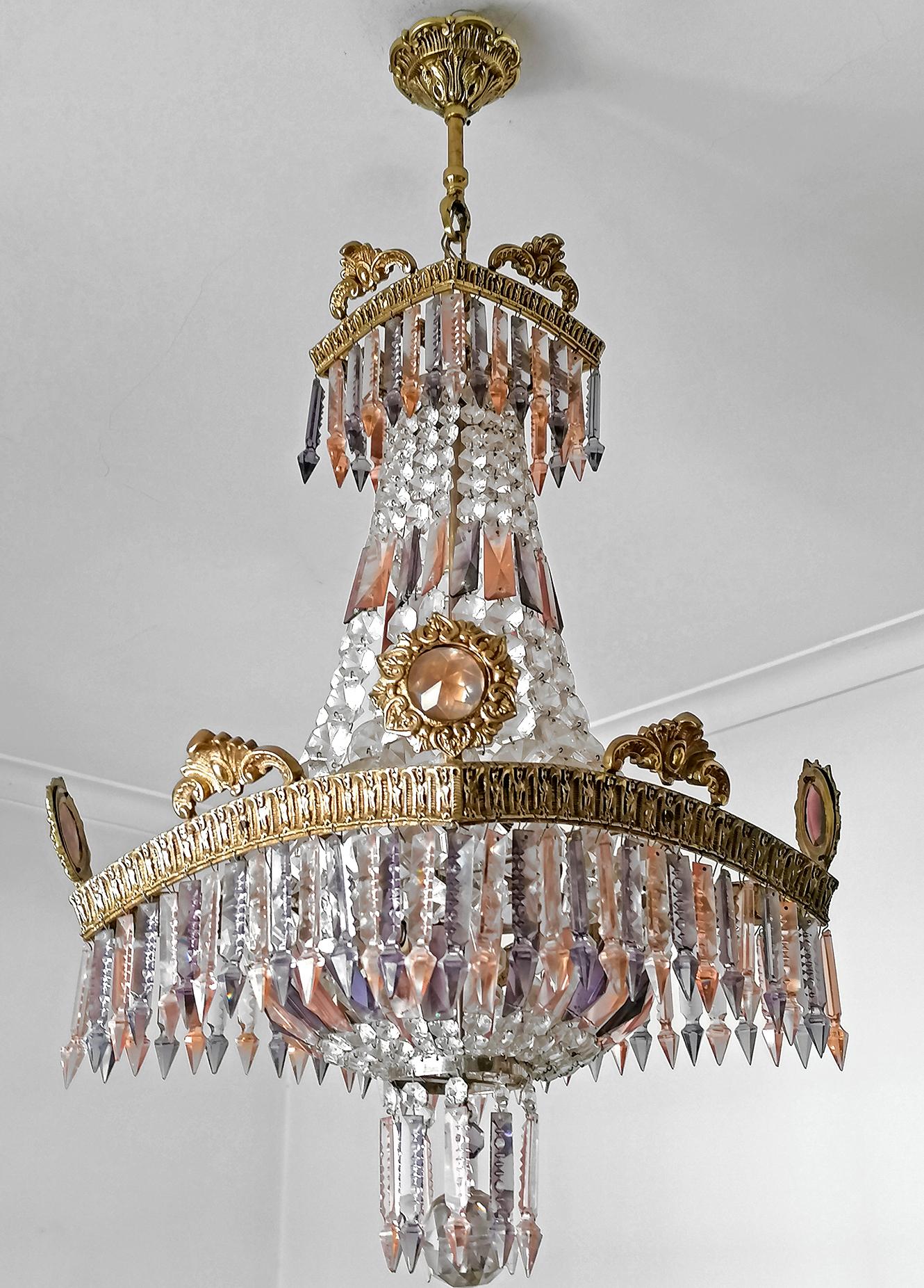 Fabulous French Empire pure crystal basket chandelier with gilt bronze frame. Early 20th Century
Dimensions
Width: 16.54 in. (42 cm)
Depth: 16.54 in. (42 cm)
Diagonal: 21.6 in/55 cm
Height Height: 39.38 in. ( 4 in chain) /(100 cm /10 cm