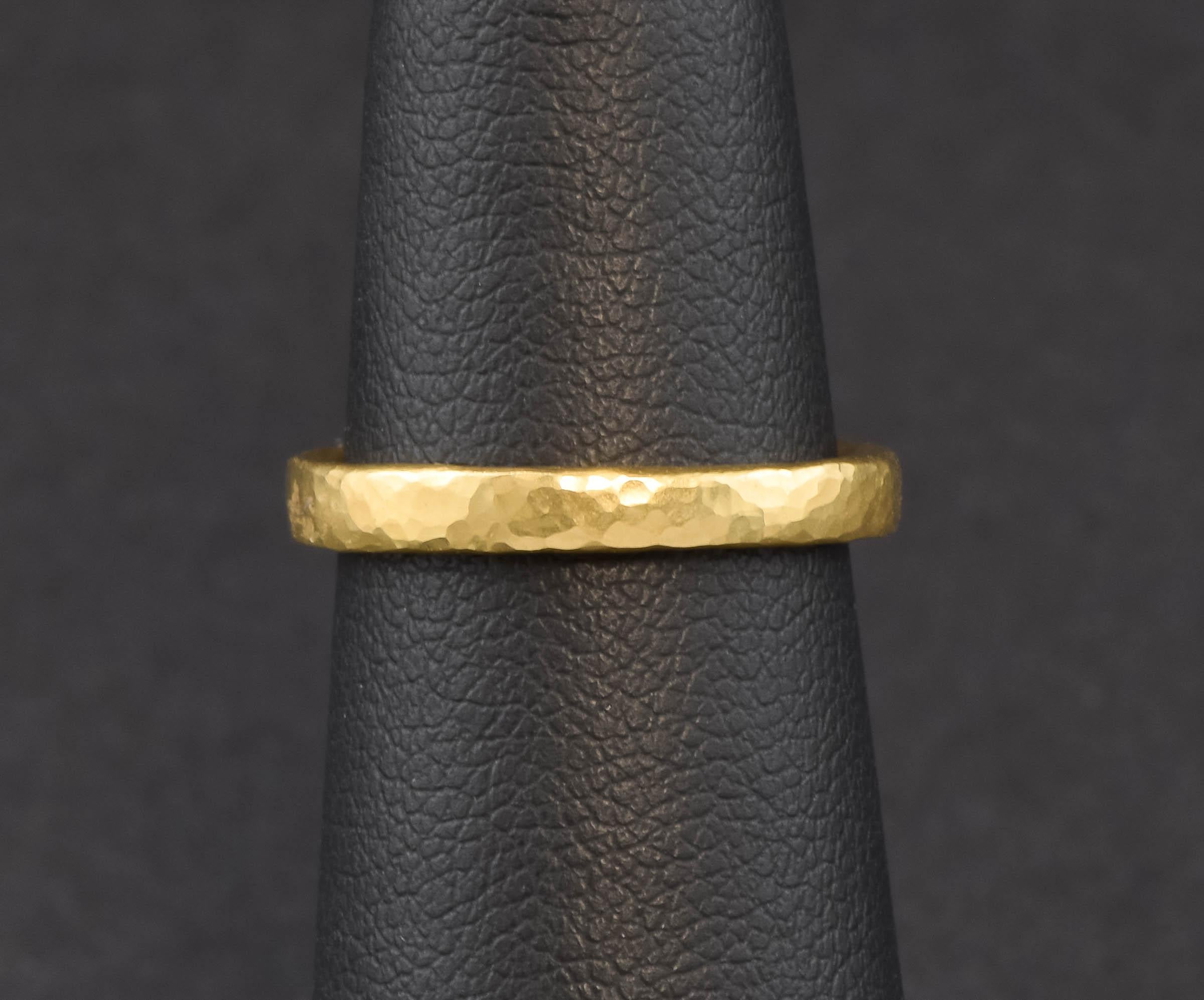 I'm pleased to offer another luxurious 22K gold band - this one with a delightful hand hammered finish that catches the light so prettily.

Crafted of solid 22K gold (still marked inside), the band has a rich, organic feel to it and a very nice