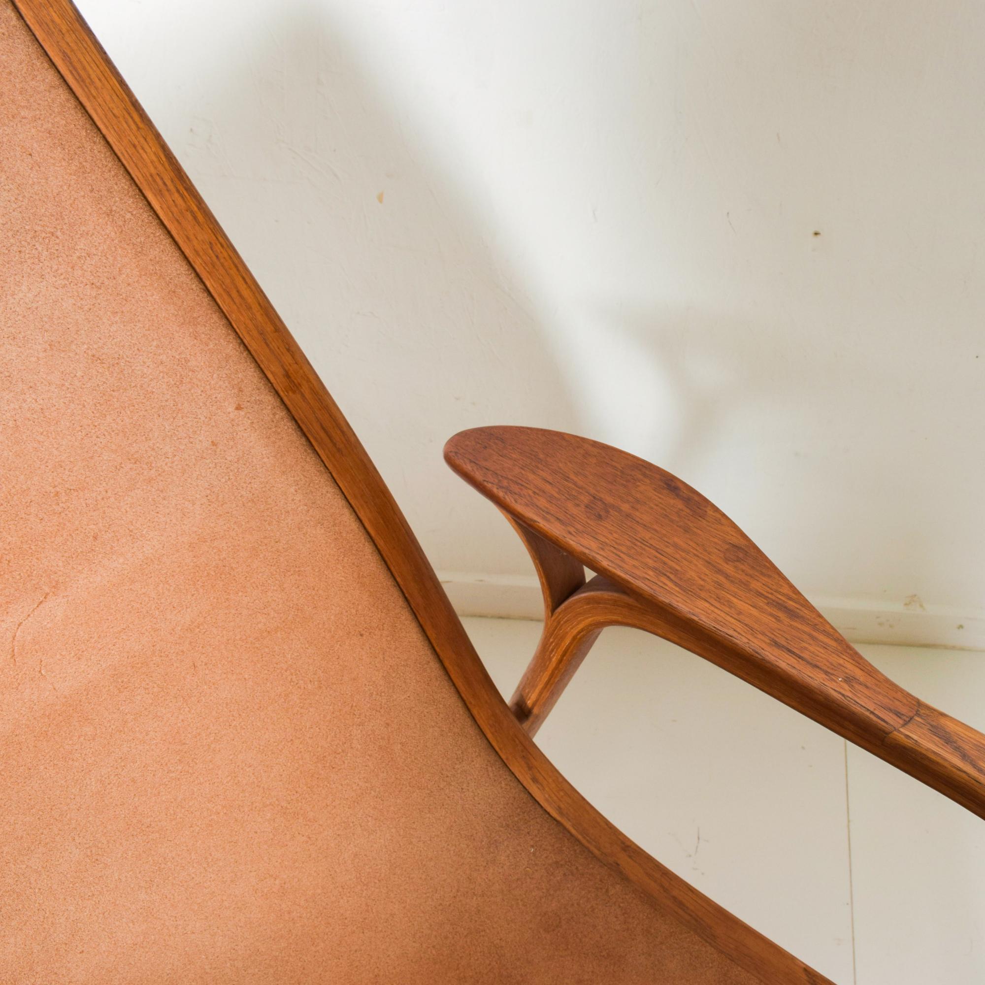 Classic Scandinavian Modern Lamino for Swedese easy lowback lounge chair in Cognac Suede leather and teak wood designed by Yngve Ekstrom, circa 1960s.
Dimensions: 30 1/2