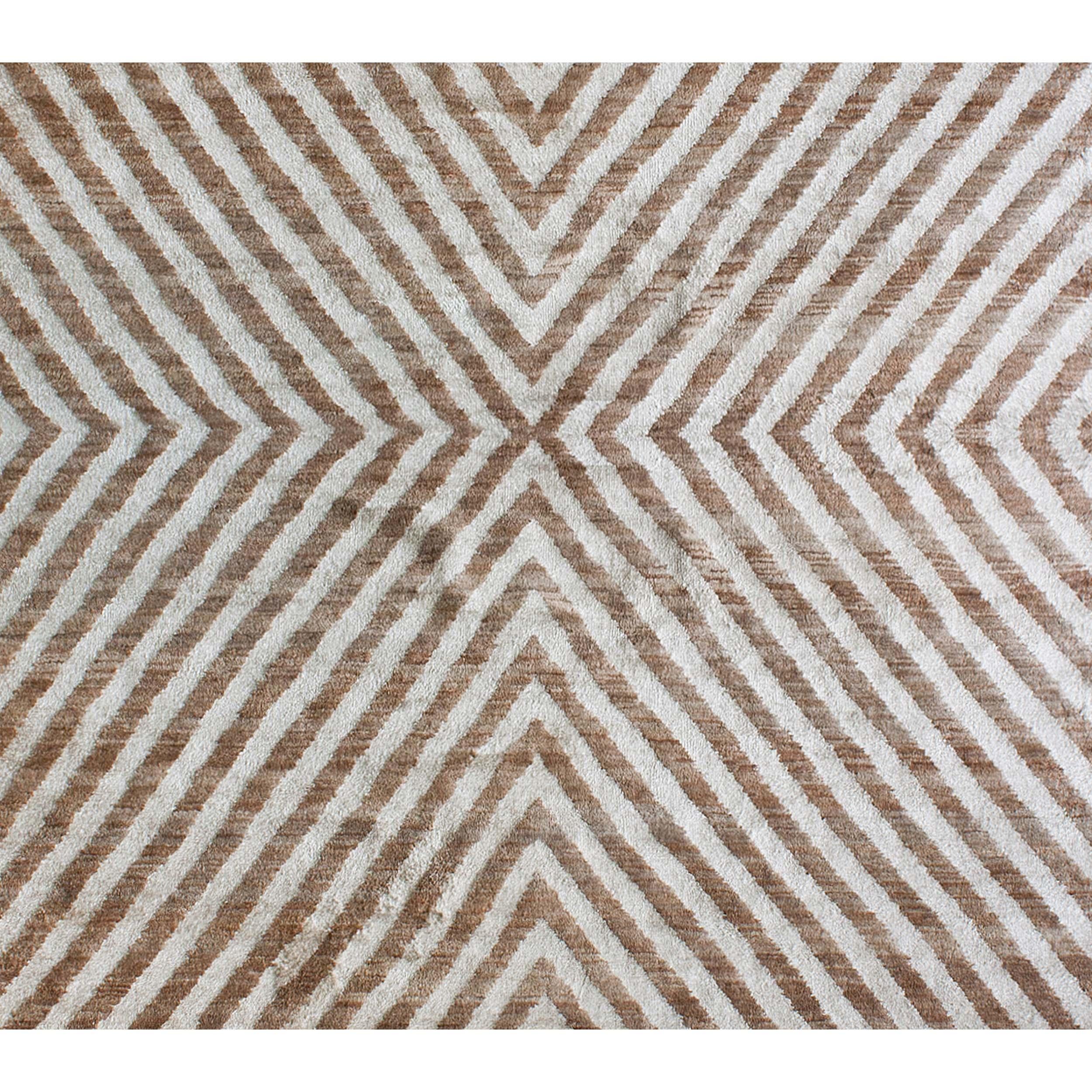 Luxurious modern hand-knotted rug with our meticulously crafted masterpiece. This rug transcends their utilitarian purpose, becoming work of art that delight the senses and seamlessly harmonize with a variety of home decor styles. Meticulously