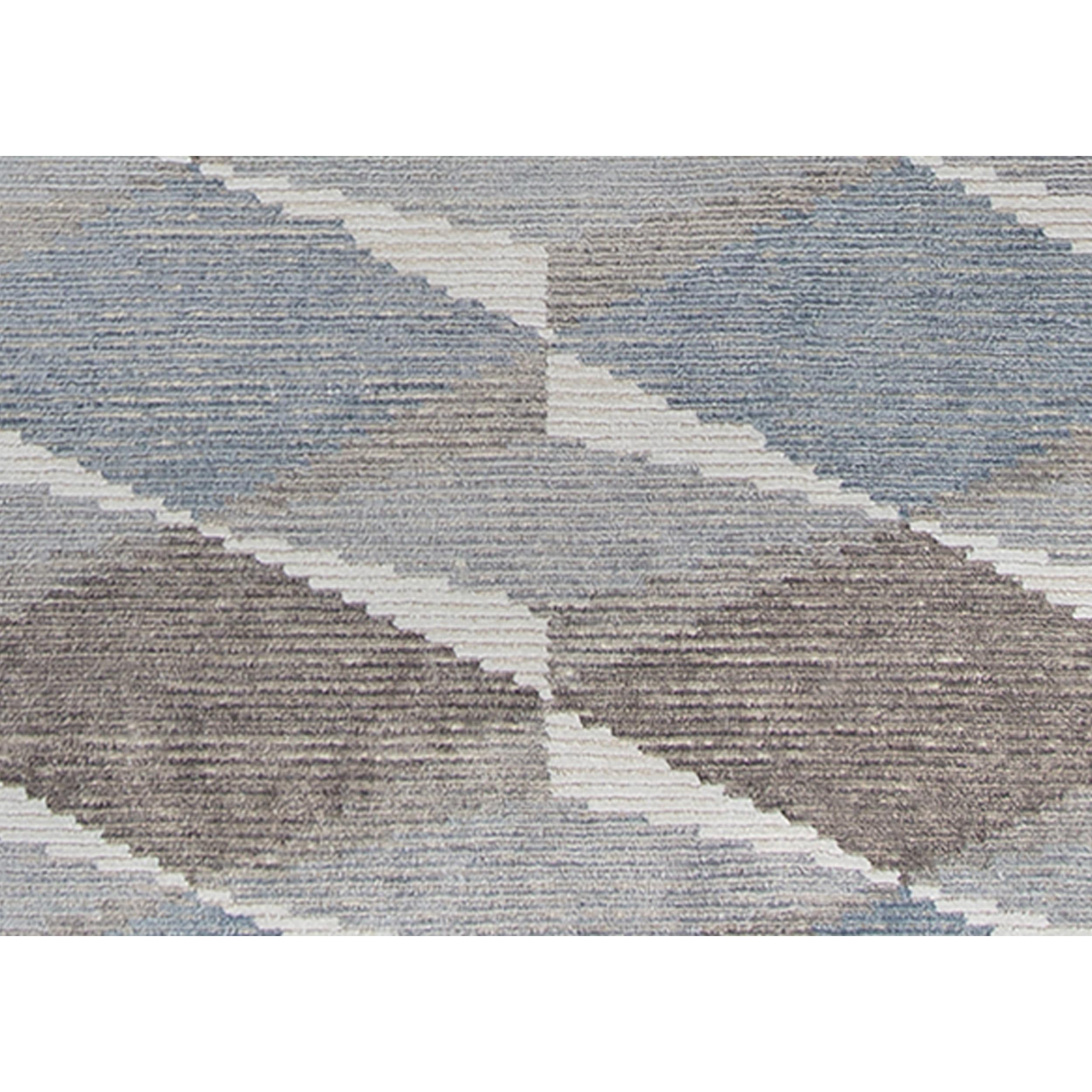 Ce tapis sophistiqué tissé à la main crée un sens subtil de la texture. Des motifs contemporains et des tons neutres actualisés qui s'intègrent parfaitement à tous les environnements. Le toucher et la vue sont ravis dans ce tapis. Un mélange unique