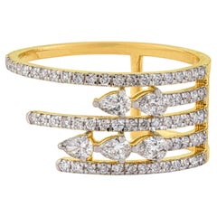 Anillo de cóctel tipo «cigar» abierto, de lujo, con varias filas de diamantes talla pera, en oro amarillo de 14K